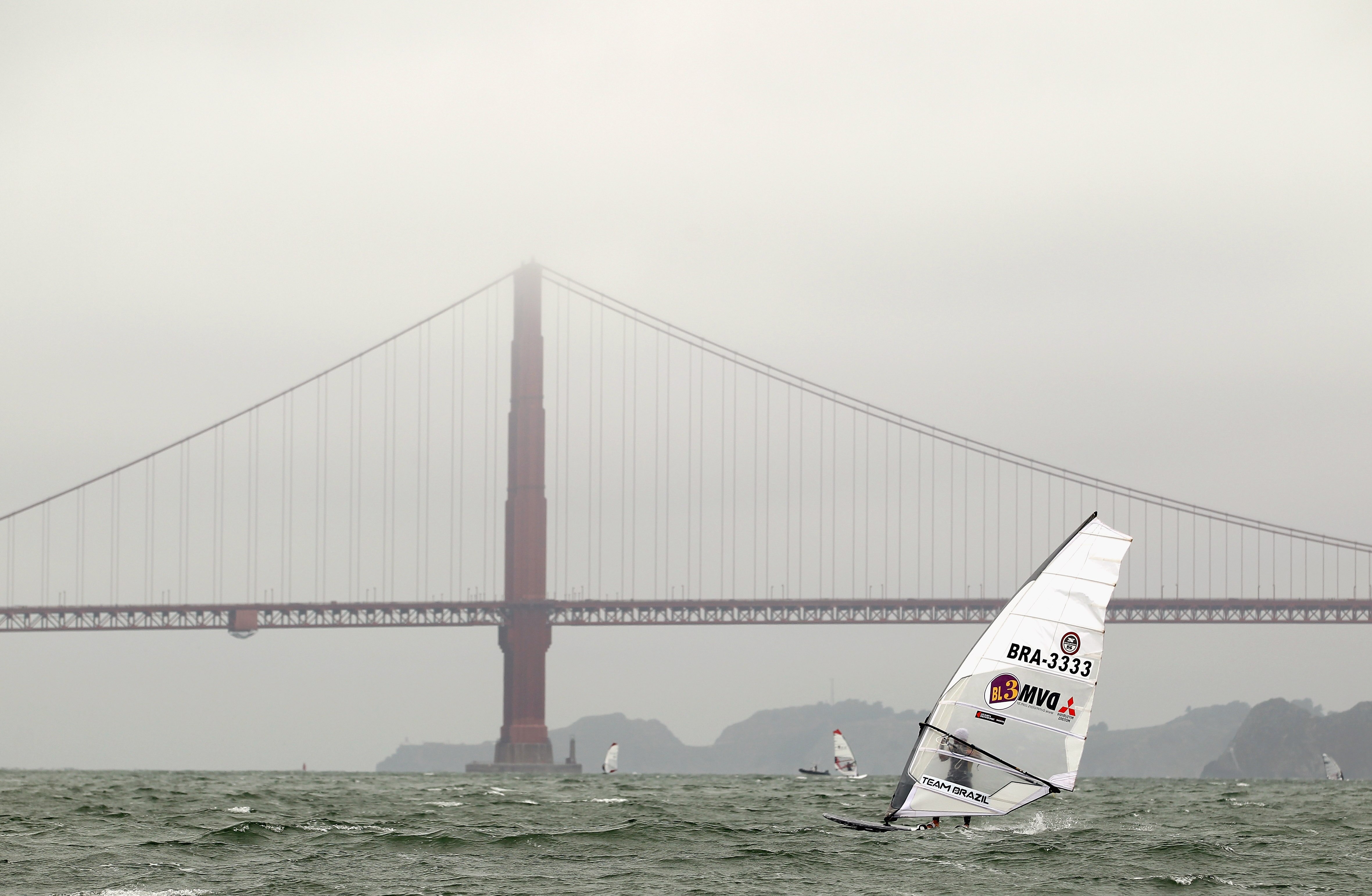 SAN FRANCISCO - JULY 20:  Paulo do Reis sails near the Golden Gate Bridge during day 1 of the US Windsurfing National Championships hosted by the St. Francis Yacht Club on July 20, 2010 in San Francisco, California.  (Photo by Ezra Shaw/Getty Images)