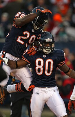 CHICAGO - NOVEMBER 28: Chester Taylor #29 and Earl Bennett #80 of the Chicago Bears celebrate a touchdown catch by Bennett against the Philadelphia Eagles at Soldier Field on November 28, 2010 in Chicago, Illinois. The Bears defeated the Eagles 31-26. (Ph