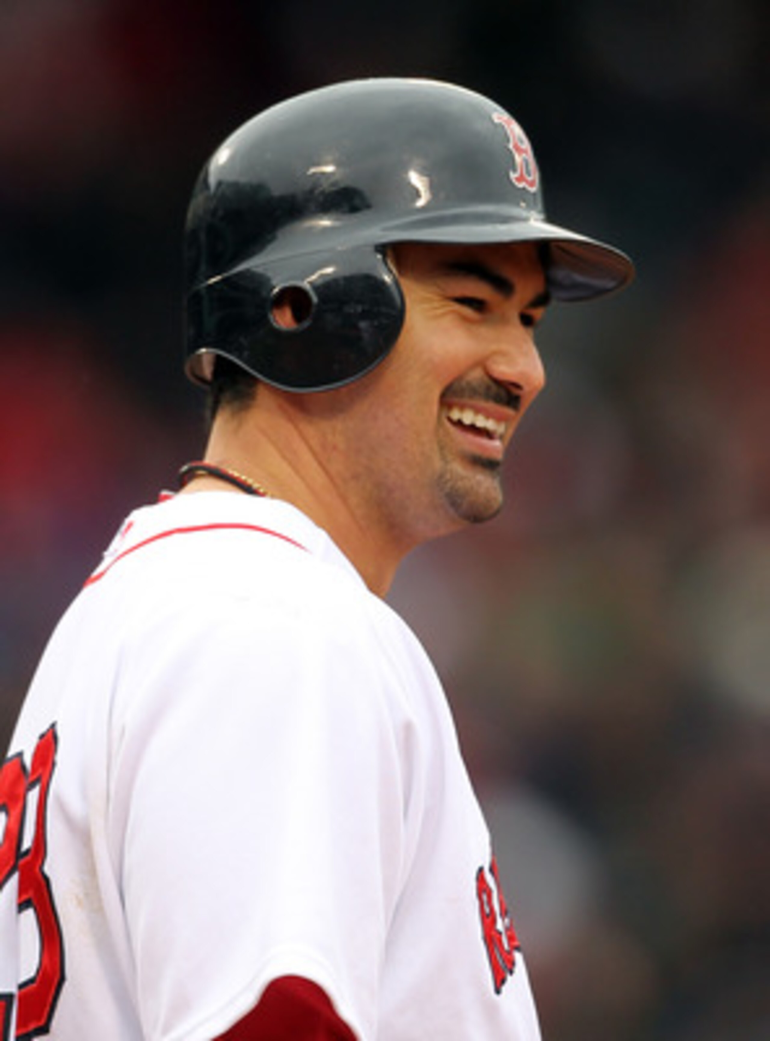 BOSTON, MA - APRIL 16, 2011:  Adrian Gonzalez #28 of the Boston Red Sox reacts against the Toronto Blue Jays at Fenway Park April 16, 2011 in Boston, Massachusetts. (Photo by Jim Rogash/Getty Images)