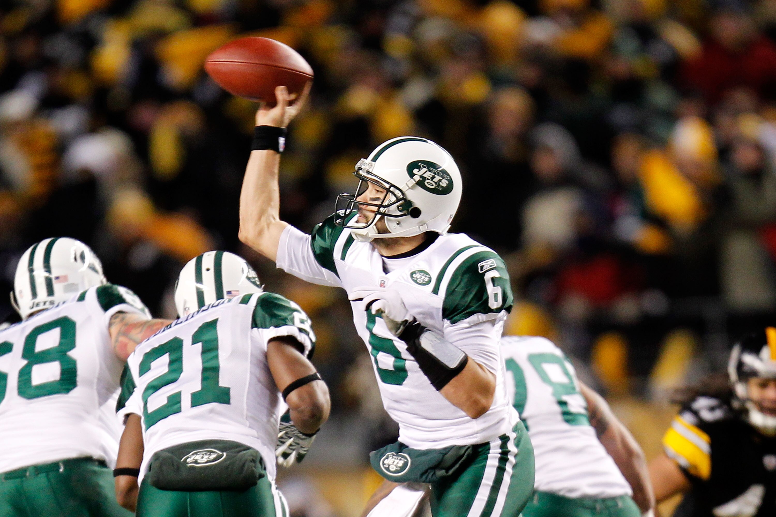 PITTSBURGH, PA - JANUARY 23:  Mark Sanchez #6 of the New York Jets drops back during their 19 to 24 loss to the Pittsburgh Steelers in the 2011 AFC Championship game at Heinz Field on January 23, 2011 in Pittsburgh, Pennsylvania.  (Photo by Gregory Shamus