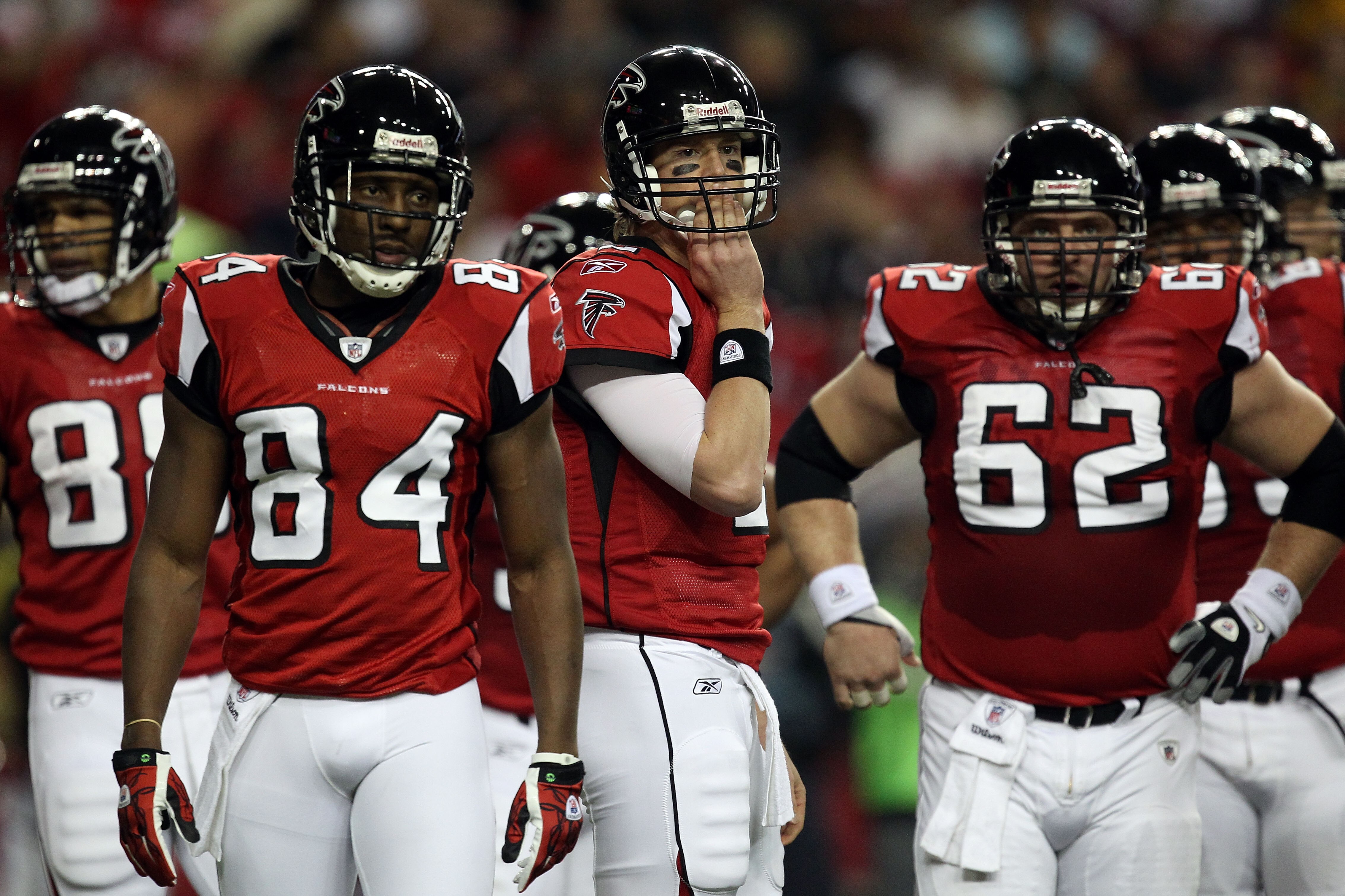 ATLANTA, GA - JANUARY 15:  (L-R) Tony Gonzalez #88, Roddy White #84, Matt Ryan #2 and Todd McClure #62 of the Atlanta Falcons look on against the Green Bay Packers during their 2011 NFC divisional playoff game at Georgia Dome on January 15, 2011 in Atlant