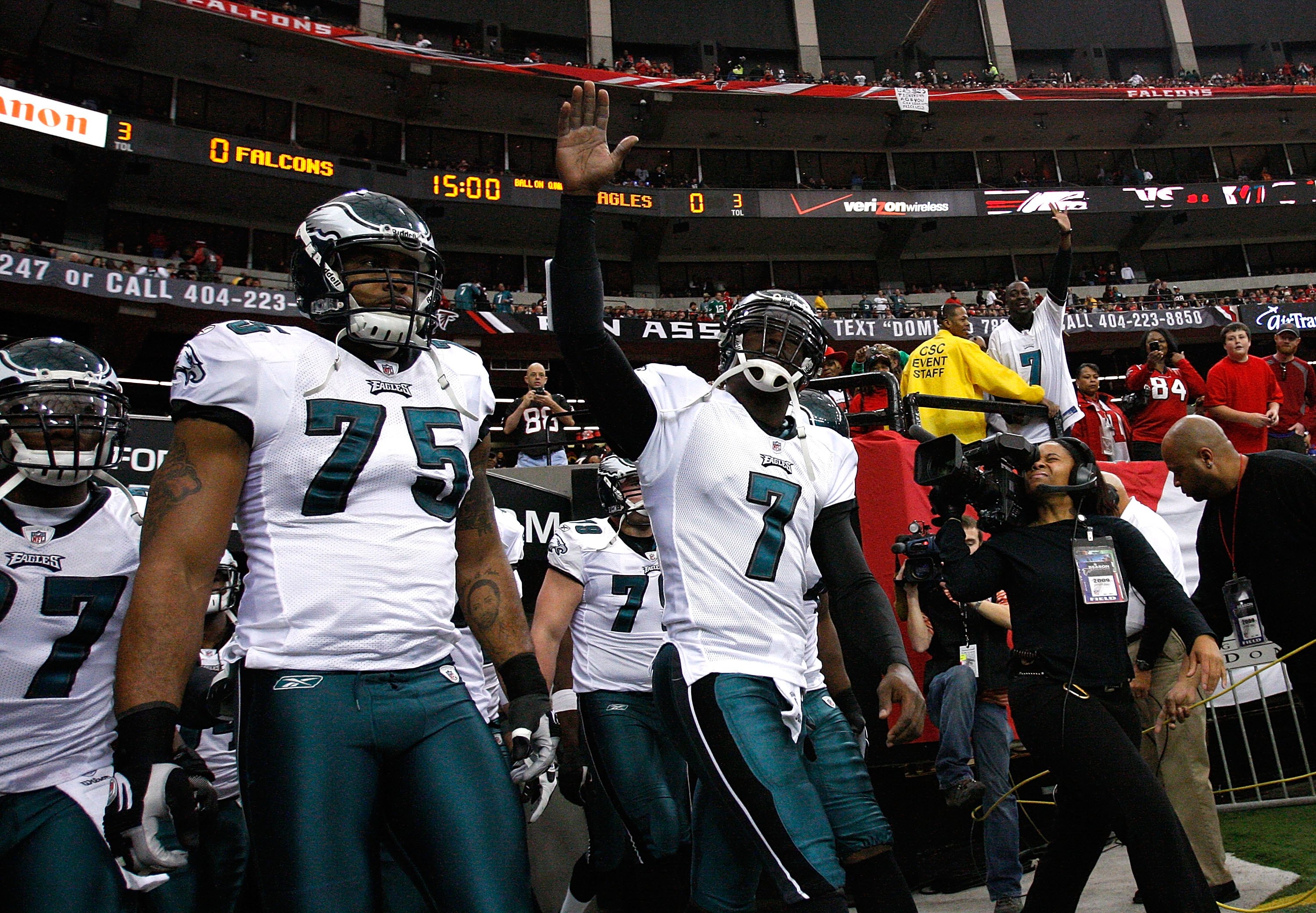 ATLANTA - DECEMBER 06:  Michael Vick #7 of the Philadelphia Eagles leads the team onto the field to face the Atlanta Falcons at Georgia Dome on December 6, 2009 in Atlanta, Georgia.  (Photo by Kevin C. Cox/Getty Images)
