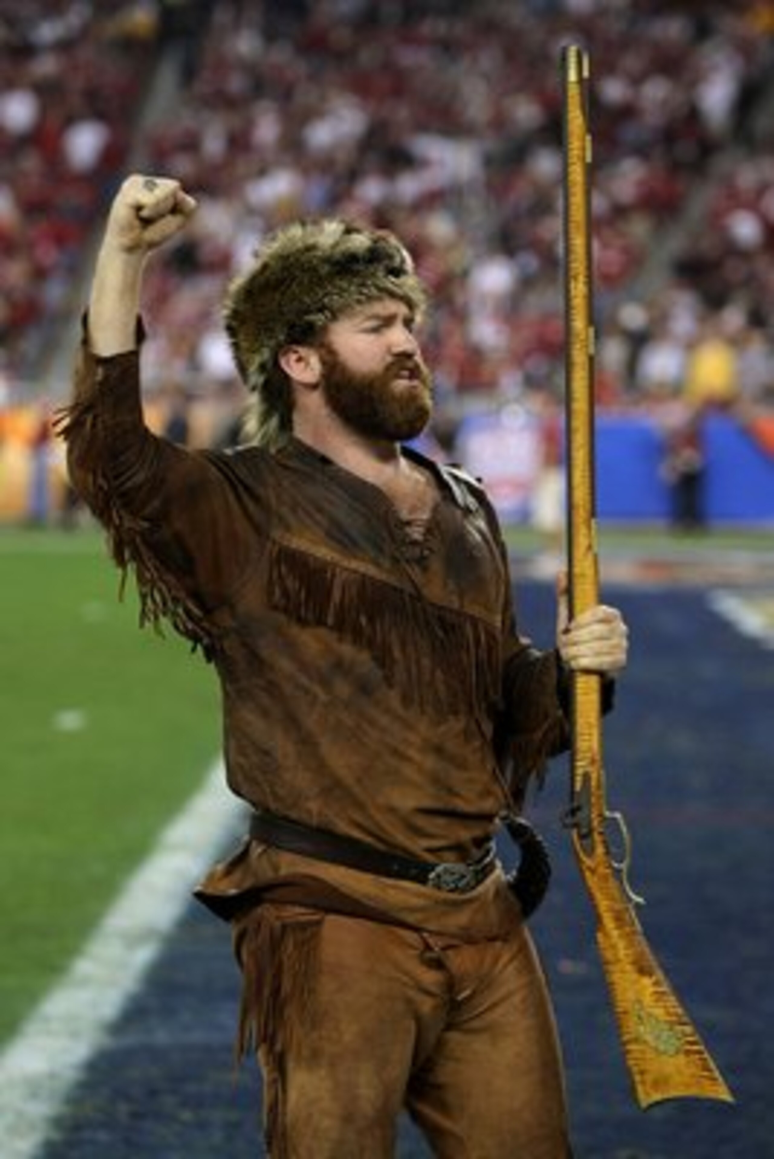 GLENDALE, AZ - JANUARY 02:  The mascot of the West Virginia Mountaineers fires up the crowd before the Mountaineers take on the Oklahoma Sooners at the Tostito's Fiesta Bowl at University of Phoenix Stadium January 2, 2008 in Glendale, Arizona.  (Photo by