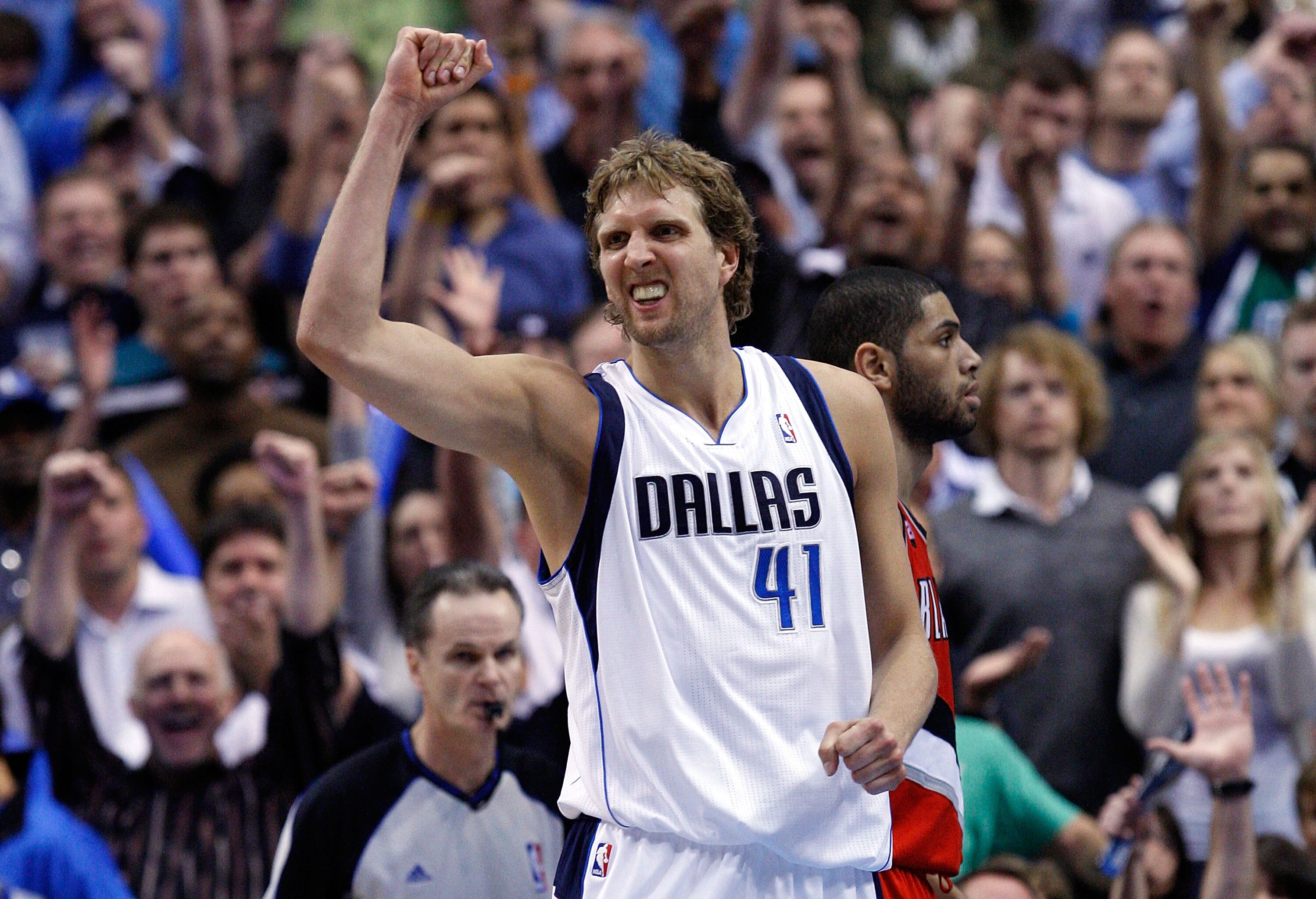 DALLAS, TX - APRIL 16:  Forward Dirk Nowitzki #41 of the Dallas Mavericks reacts against the Portland Trail Blazers in Game One of the Western Conference Quarterfinals during the 2011 NBA Playoffs on April 16, 2011 at American Airlines Center in Dallas, T