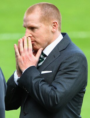 KILMARNOCK, SCOTLAND - APRIL 20:  Celtic coach Neil Lennon walks of the pitch at Kilmarnock on April 20, 2011 in Kilmarnock, Scotland. The head coach of Celtic whose team face Kilmarnock tonight, was at the centre of a police investigation following a par