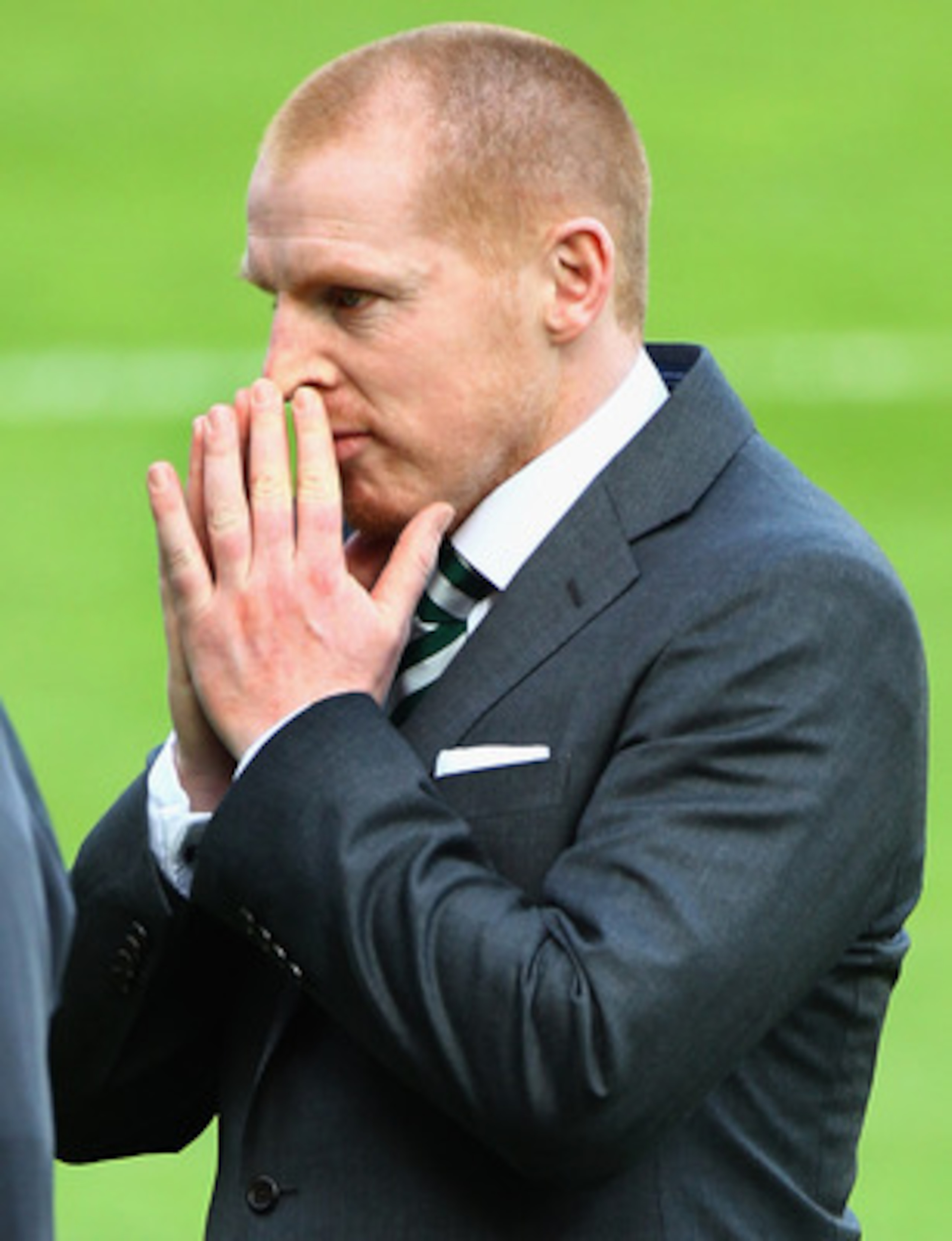 KILMARNOCK, SCOTLAND - APRIL 20:  Celtic coach Neil Lennon walks of the pitch at Kilmarnock on April 20, 2011 in Kilmarnock, Scotland. The head coach of Celtic whose team face Kilmarnock tonight, was at the centre of a police investigation following a par