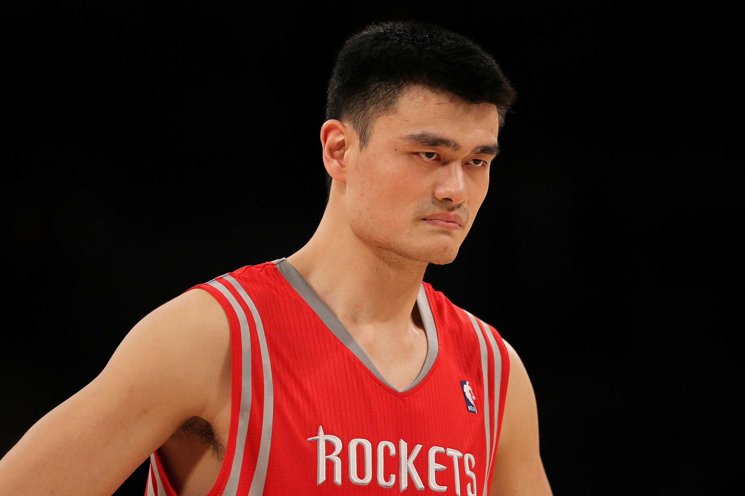 LOS ANGELES, CA - OCTOBER 26:  Yao Ming #11 of the Houston Rockets looks on during their opening night game against the Los Angeles Lakers at Staples Center on October 26, 2010 in Los Angeles, California. NOTE TO USER: User expressly acknowledges and agre