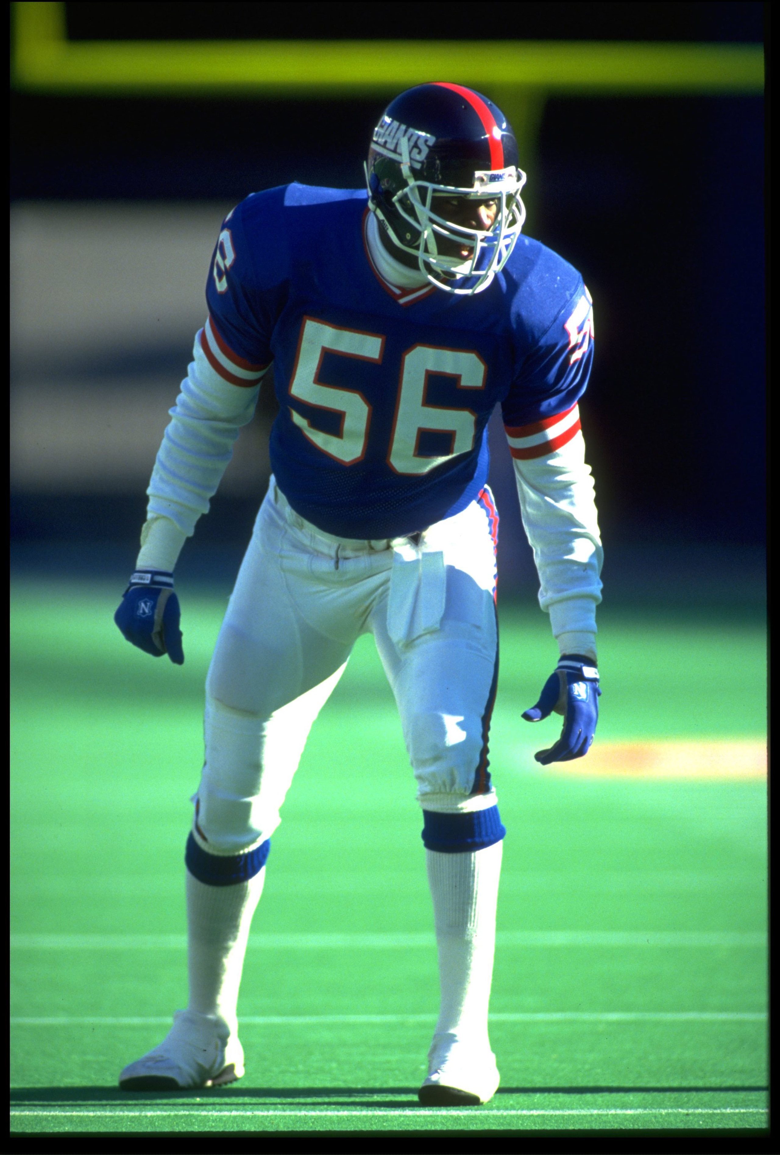 18 NOV 1990:  LAWRENCE TAYLOR, LINEBACKER FOR THE NEW YORK GIANTS, PREPARES FOR A PLAY AGAINST THE DETROIT LIONS DURING NEW YORK''S 20-0 WIN AT GIANTS STADIUM IN EAST RUTHERFORD, NEW JERSEY.  MANDATORY CREDIT:  RICK STEWART/ALLSPORT