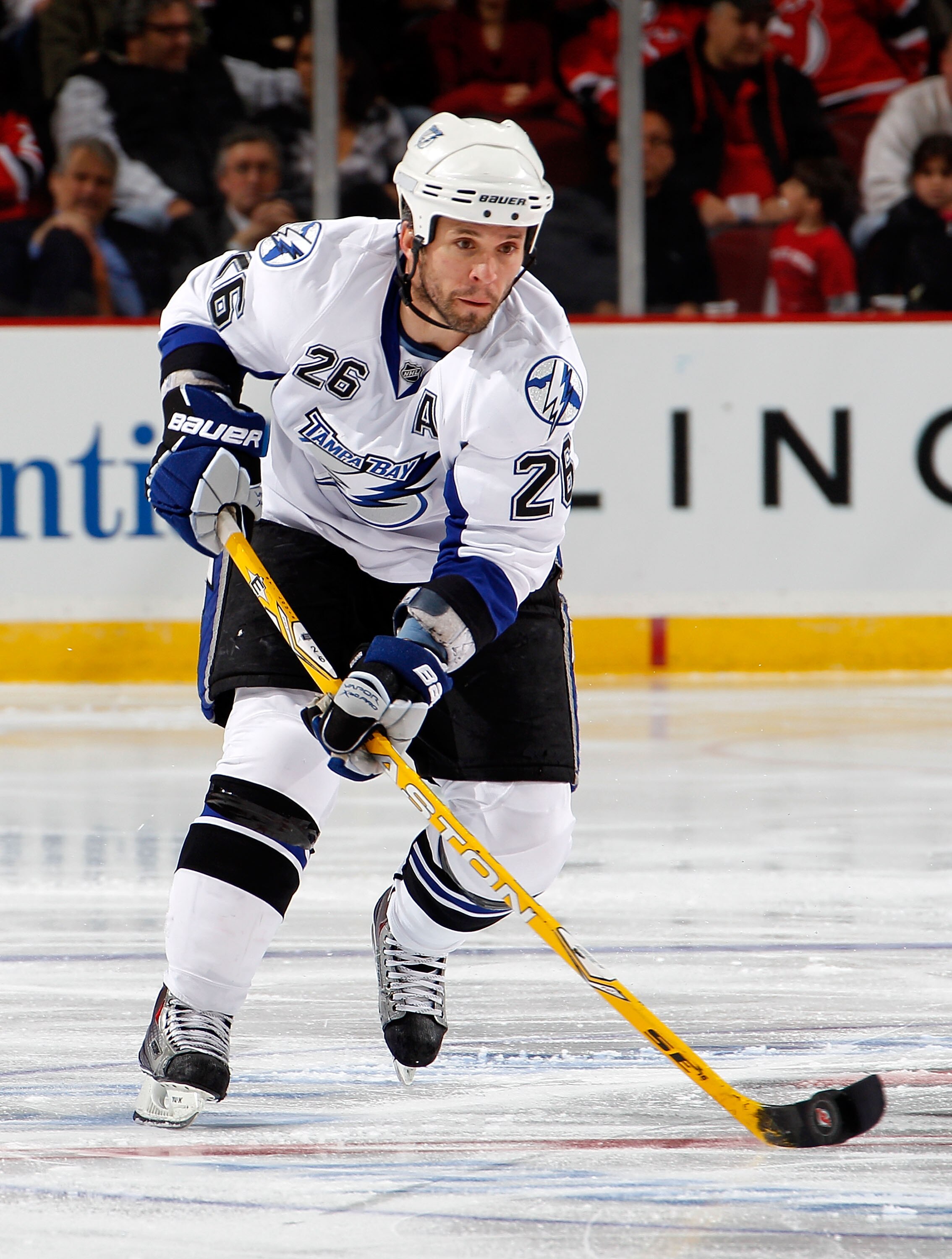 NEWARK, NJ - MARCH 02:  Martin St. Louis #26 of the Tampa Bay Lightning skates during an NHL hockey game against the New Jersey Devils at the Prudential Center on March 2, 2011 in Newark, New Jersey.  (Photo by Paul Bereswill/Getty Images)