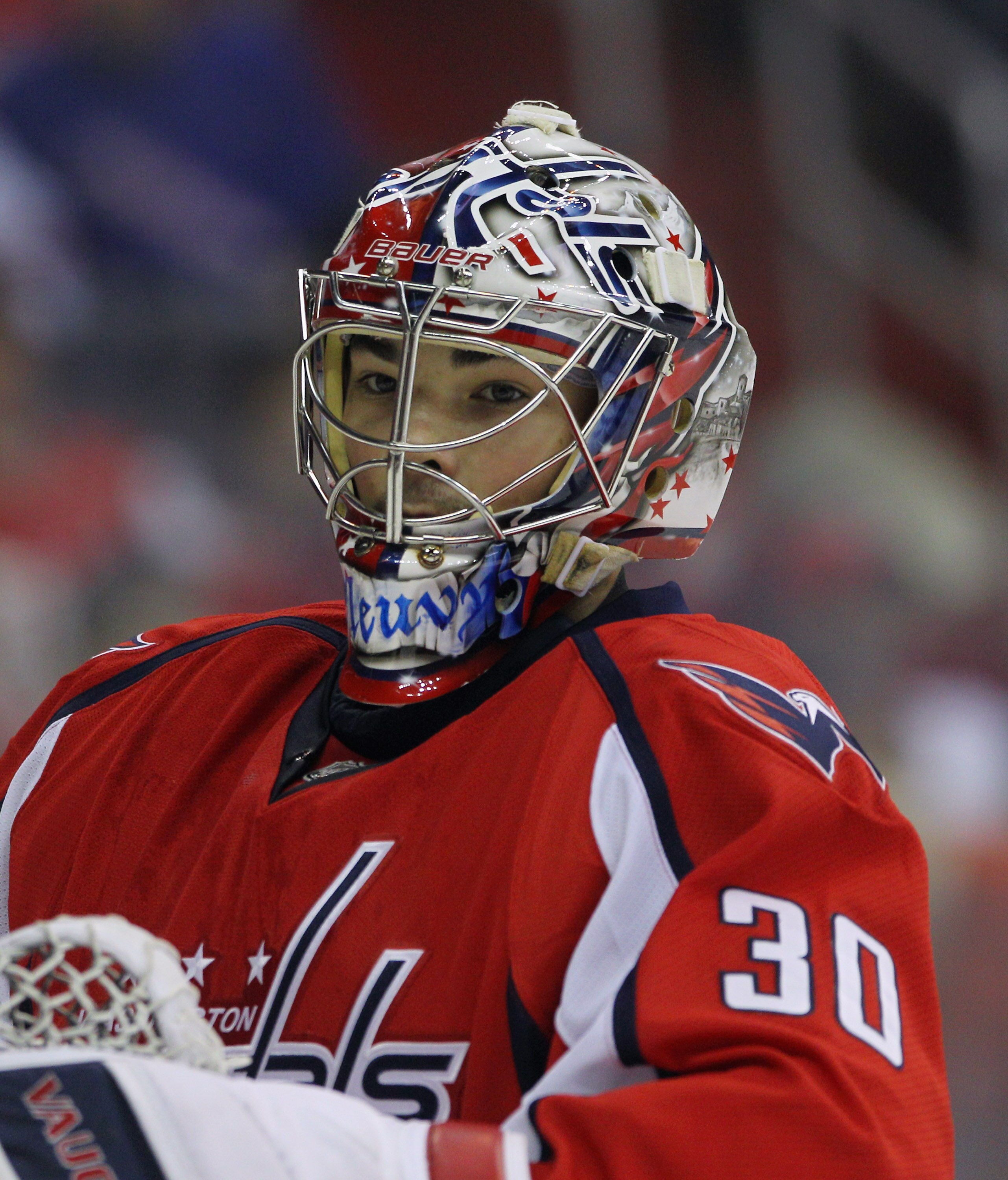 WASHINGTON, DC - APRIL 15:  Michal Neuvirth #30 of the Washington Capitals takes a break in the first period in the game against the New York Rangers in Game Two of the Eastern Conference Quarterfinals during the 2011 NHL Stanley Cup Playoffs at Verizon C