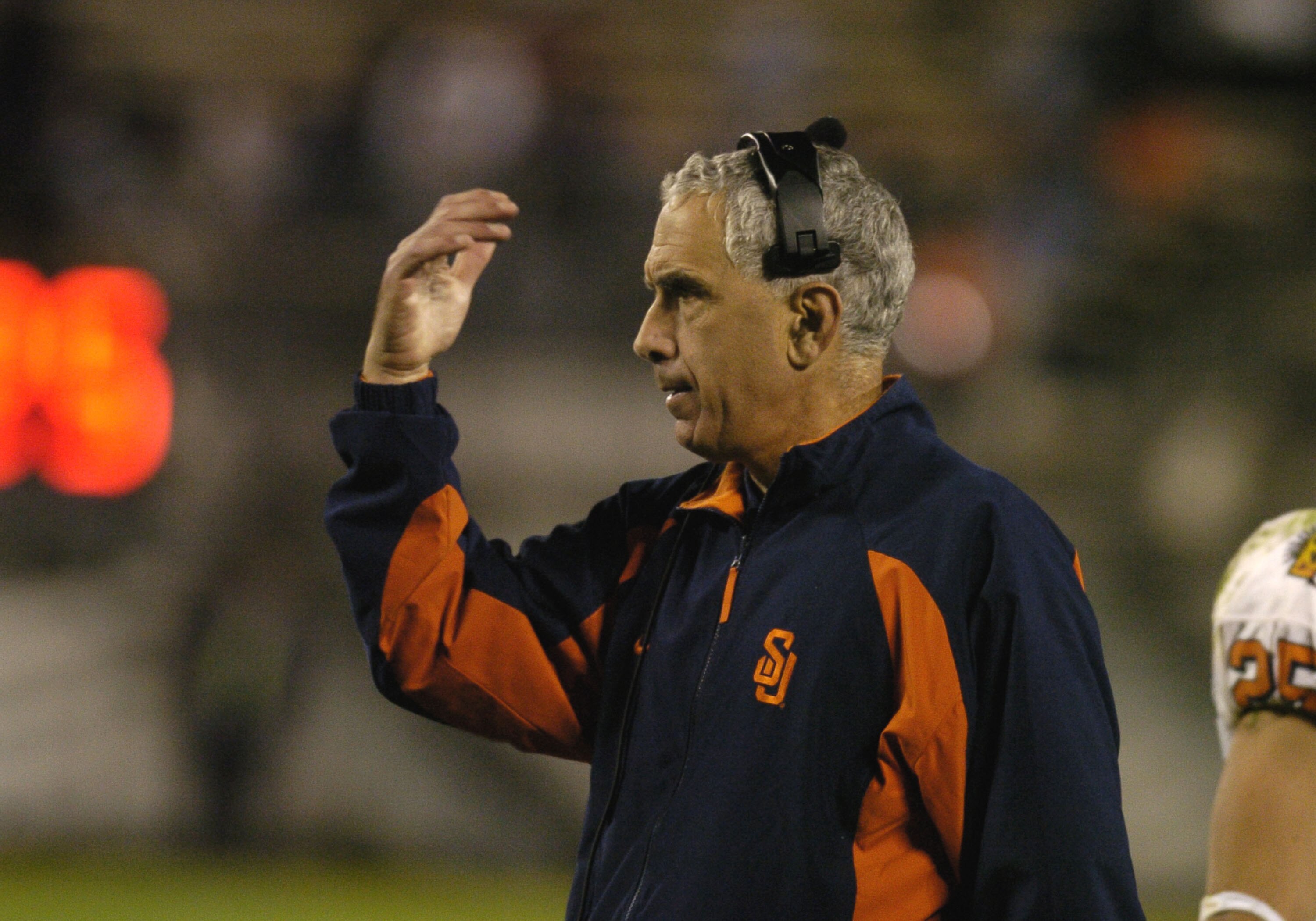 Syracuse coach Paul Pasqualoni directs play  during halftime against  Georgia Tech  in the Champs Sports Bowl at the Florida Citrus Bowl, Orlando, Florida Dec 21, 2004. (Photo by A. Messerschmidt/Getty Images) *** Local Caption ***