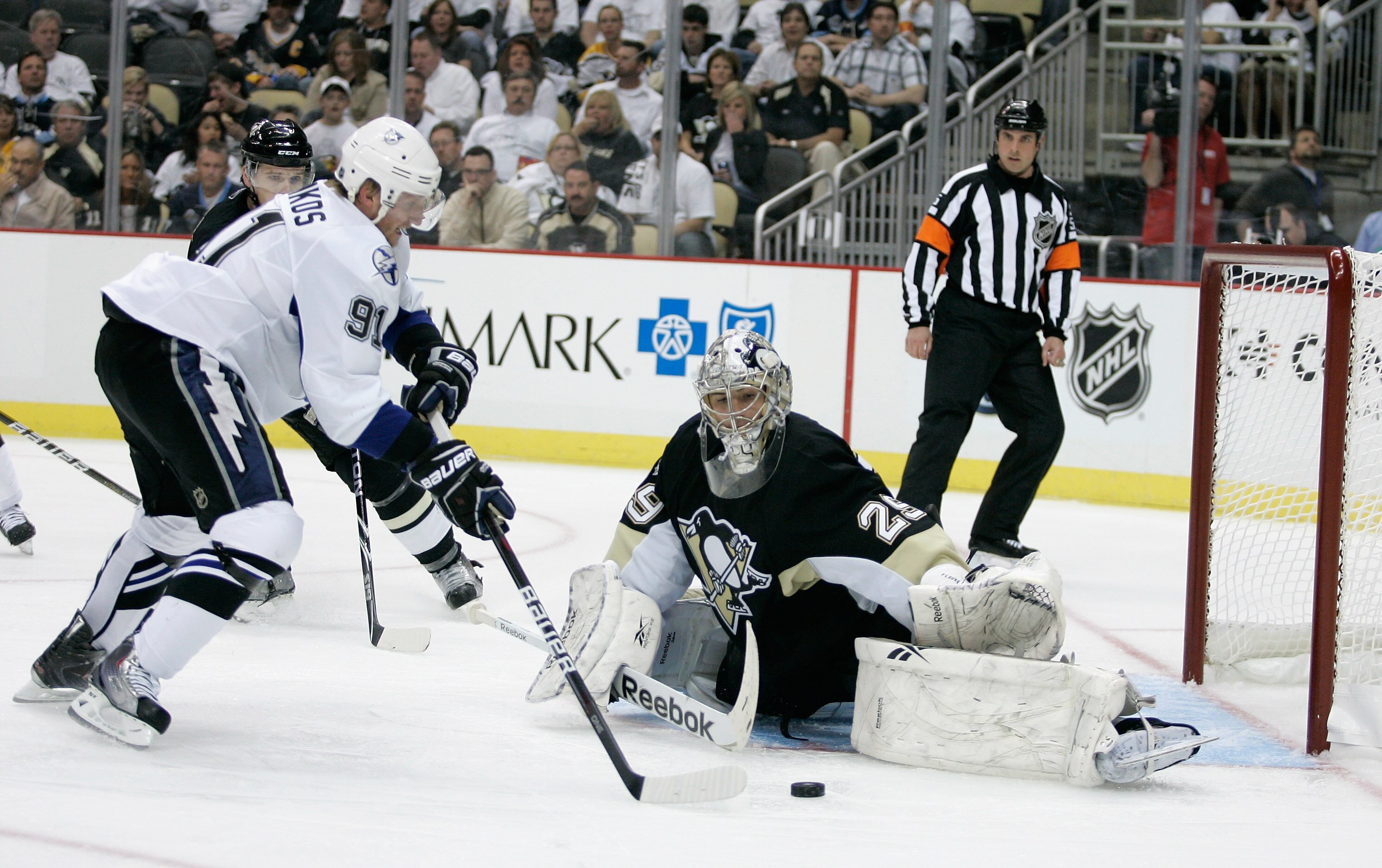 PITTSBURGH, PA - APRIL 15:  Steven Stamkos #91 of the Tampa Bay Lightning takes a shot against Marc-Andre Fleury #29 of the Pittsburgh Penguins during Game Two of the Eastern Conference Quarterfinals during the 2011 NHL Stanley Cup Playoffs at Consol Ener