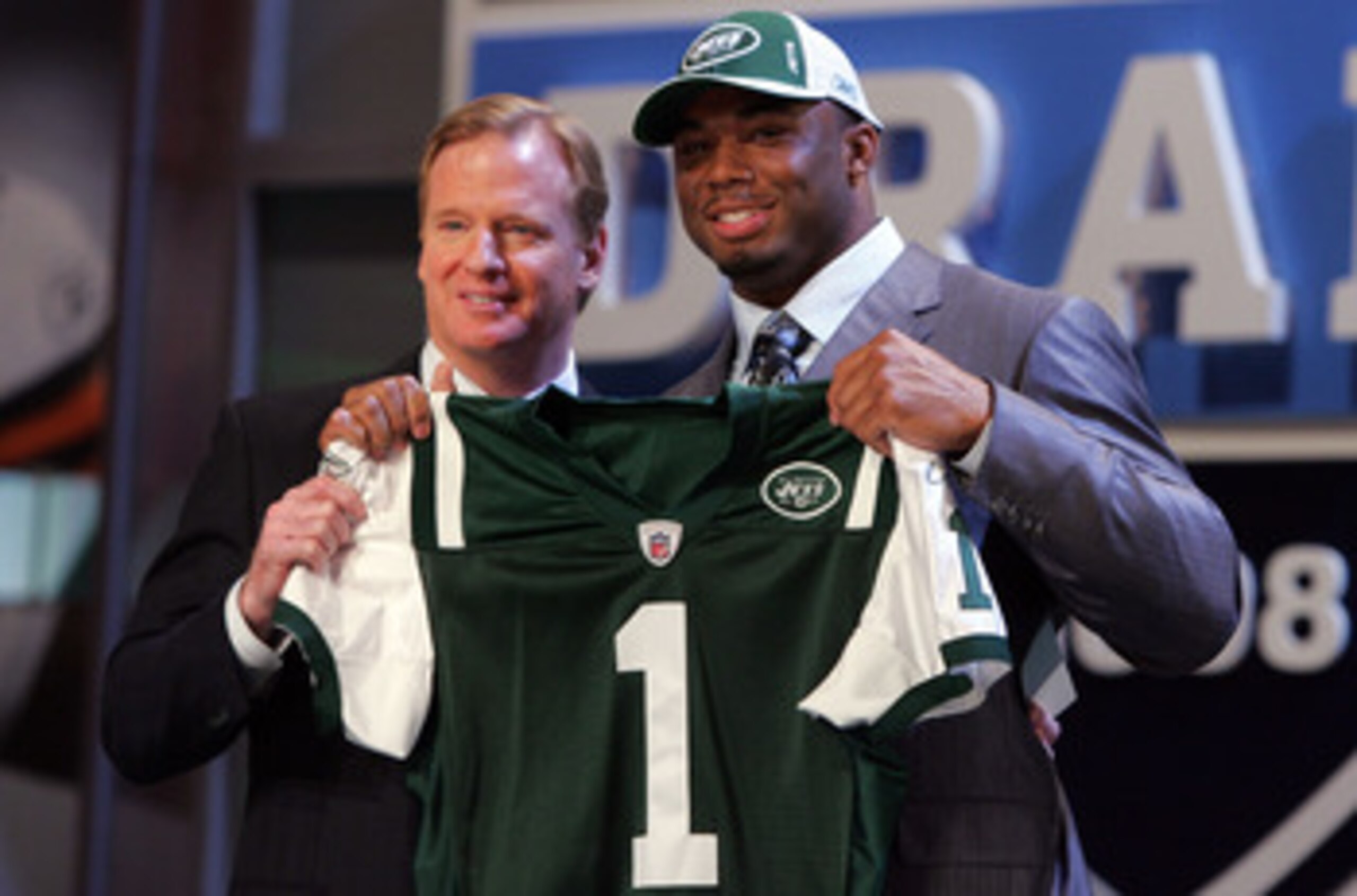 NEW YORK - APRIL 26: Vernon Gholston poses for a photo after being selected as the sixth overall pick by the New York Jets with National Football League Commissioner Roger Goodell during the 2008 NFL Draft on April 26, 2008 at Radio City Music Hall in Ap NEW YORK - APRIL 26: Vernon Gholston poses for a photo after being selected as the sixth overall pick by the New York Jets with National Football League Commissioner Roger Goodell during the 2008 NFL Draft on April 26, 2008 at Radio City Music Hall in Ap