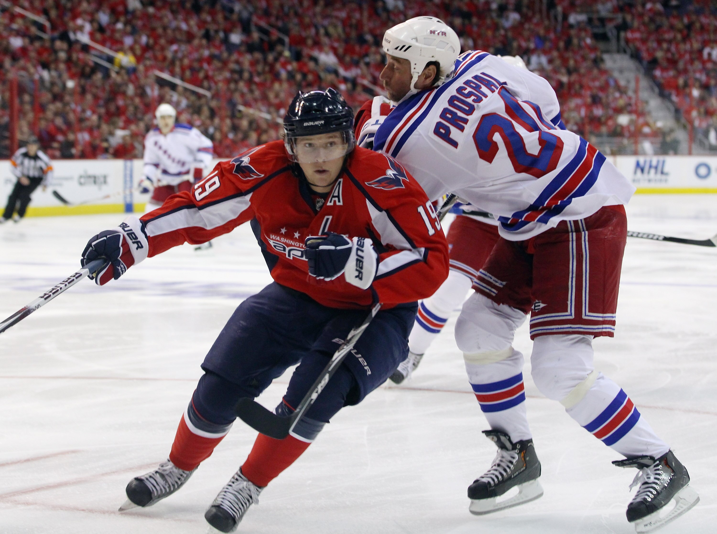 WASHINGTON, DC - APRIL 13:  Nicklas Backstrom #19 of the Washington Capitals skates against Vaclav Prospal #20 of the New York Rangers in Game One of the Eastern Conference Quarterfinals during the 2011 NHL Stanley Cup Playoffs at Verizon Center on April