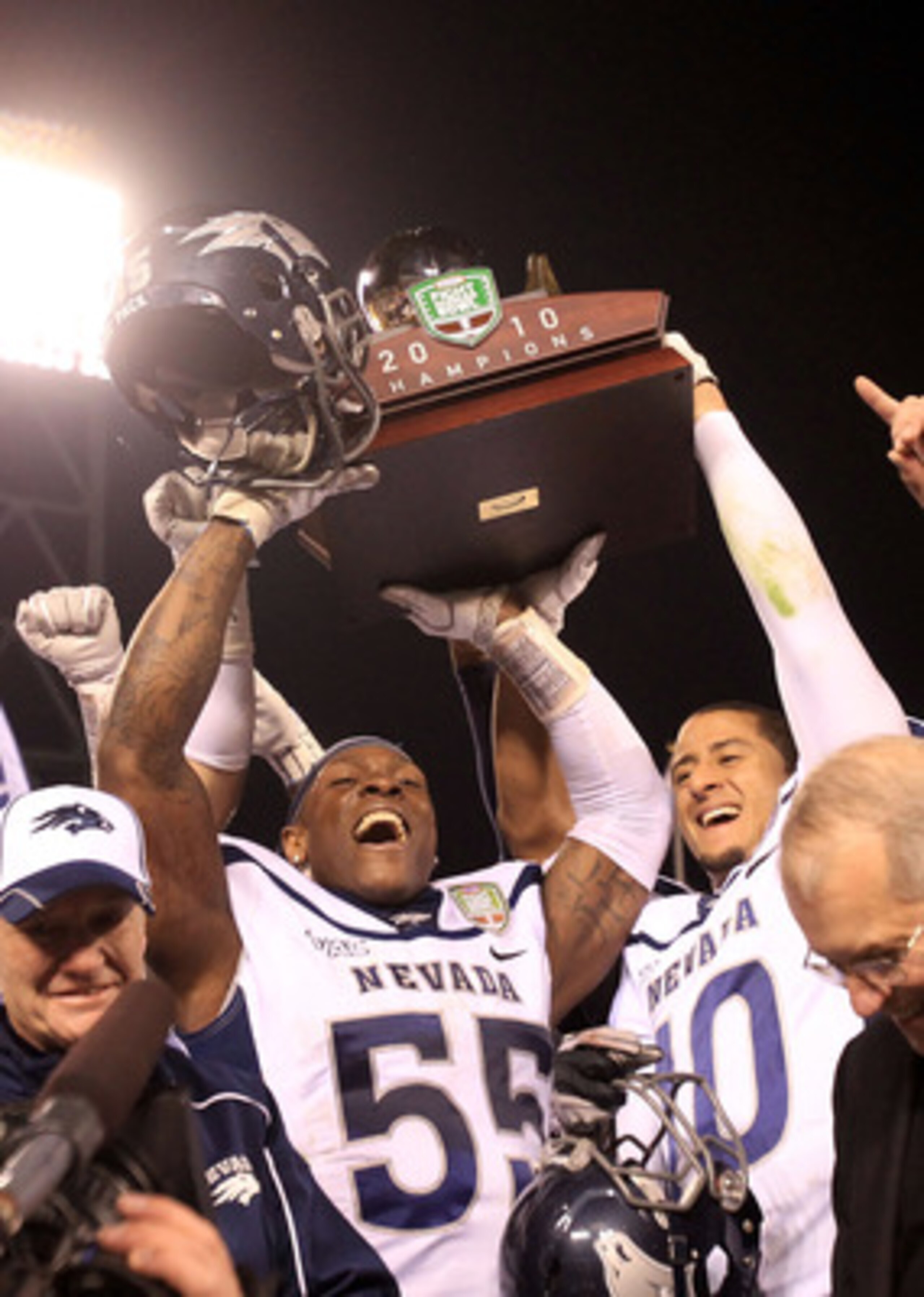 SAN FRANCISCO, CA - JANUARY 09: Dontay Moch #55 and Colin Kaepernick #10 of the Nevada Wolf Pack hold up the trophy after they beat Boston College in the Kraft Fight Hunger Bowl at AT&T Park on January 9, 2011 in San Francisco, California. (Photo by Ezr SAN FRANCISCO, CA - JANUARY 09: Dontay Moch #55 and Colin Kaepernick #10 of the Nevada Wolf Pack hold up the trophy after they beat Boston College in the Kraft Fight Hunger Bowl at AT&T Park on January 9, 2011 in San Francisco, California. (Photo by Ezr