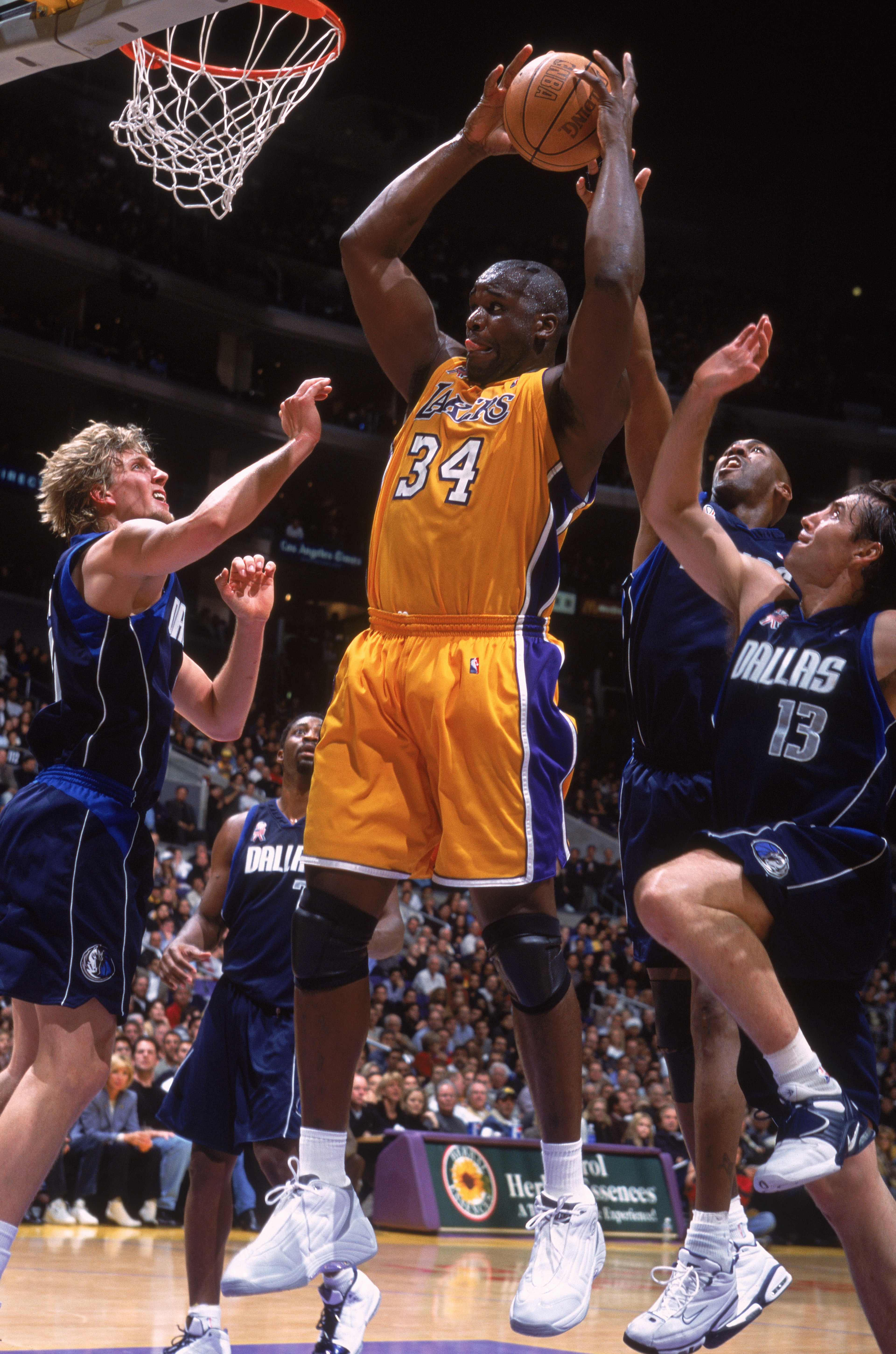 05 Dec 2001: Center Shaquille O''Neal #34 of the Los Angeles Lakers drives to the basket against the Dallas Mavericks during the NBA game at the Staples Center in Los Angeles, California. The Lakers defeated the Mavericks 98-94. NOTE TO USER: User expr 05 Dec 2001: Center Shaquille O''Neal #34 of the Los Angeles Lakers drives to the basket against the Dallas Mavericks during the NBA game at the Staples Center in Los Angeles, California. The Lakers defeated the Mavericks 98-94. NOTE TO USER: User expr