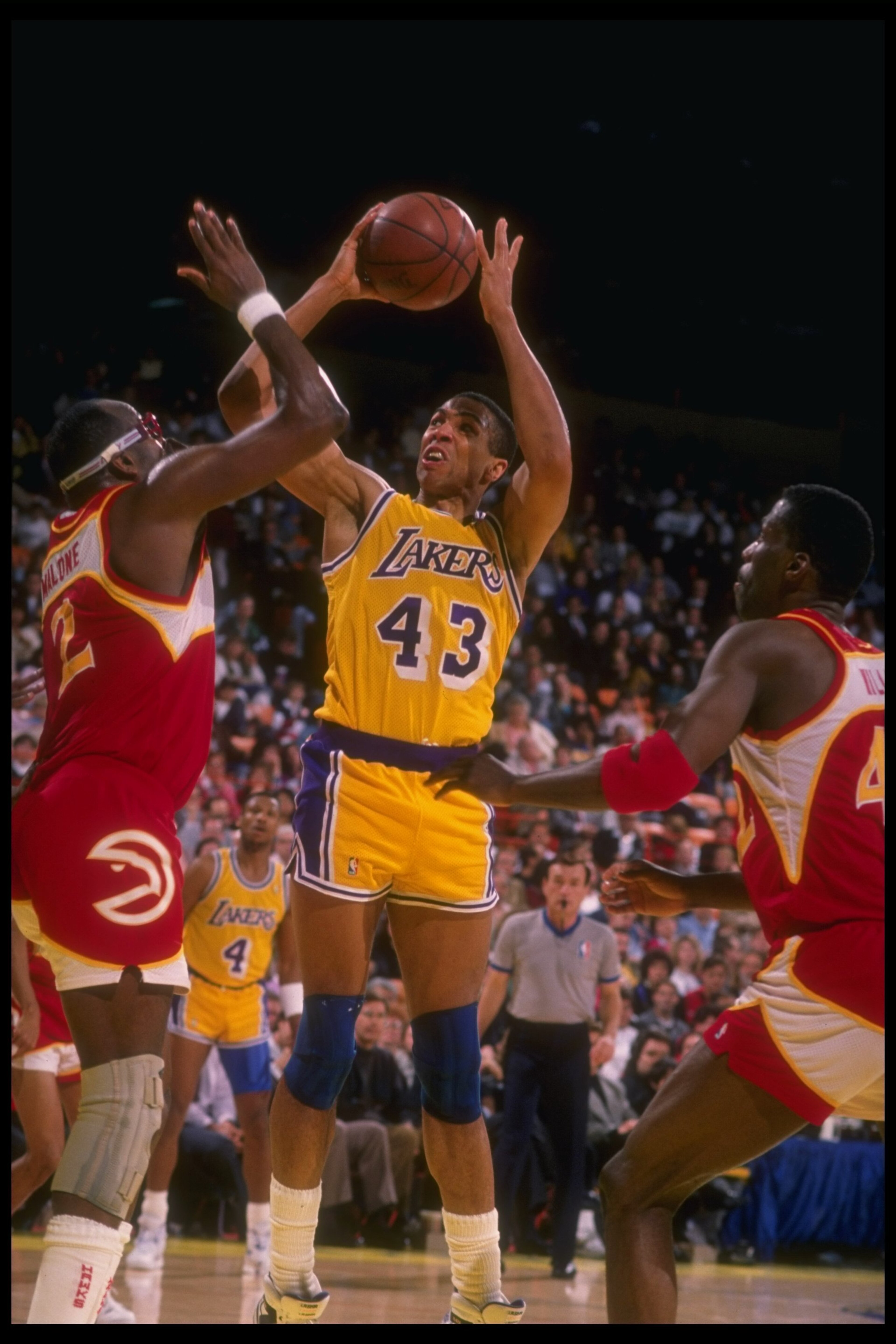 1989-1990: Mychal Thompson of the Los Angeles Lakers shoots the ball during a game. Mandatory Credit: Ken Levine /Allsport Mandatory Credit: Ken Levine /Allsport 1989-1990: Mychal Thompson of the Los Angeles Lakers shoots the ball during a game. Mandatory Credit: Ken Levine /Allsport Mandatory Credit: Ken Levine /Allsport