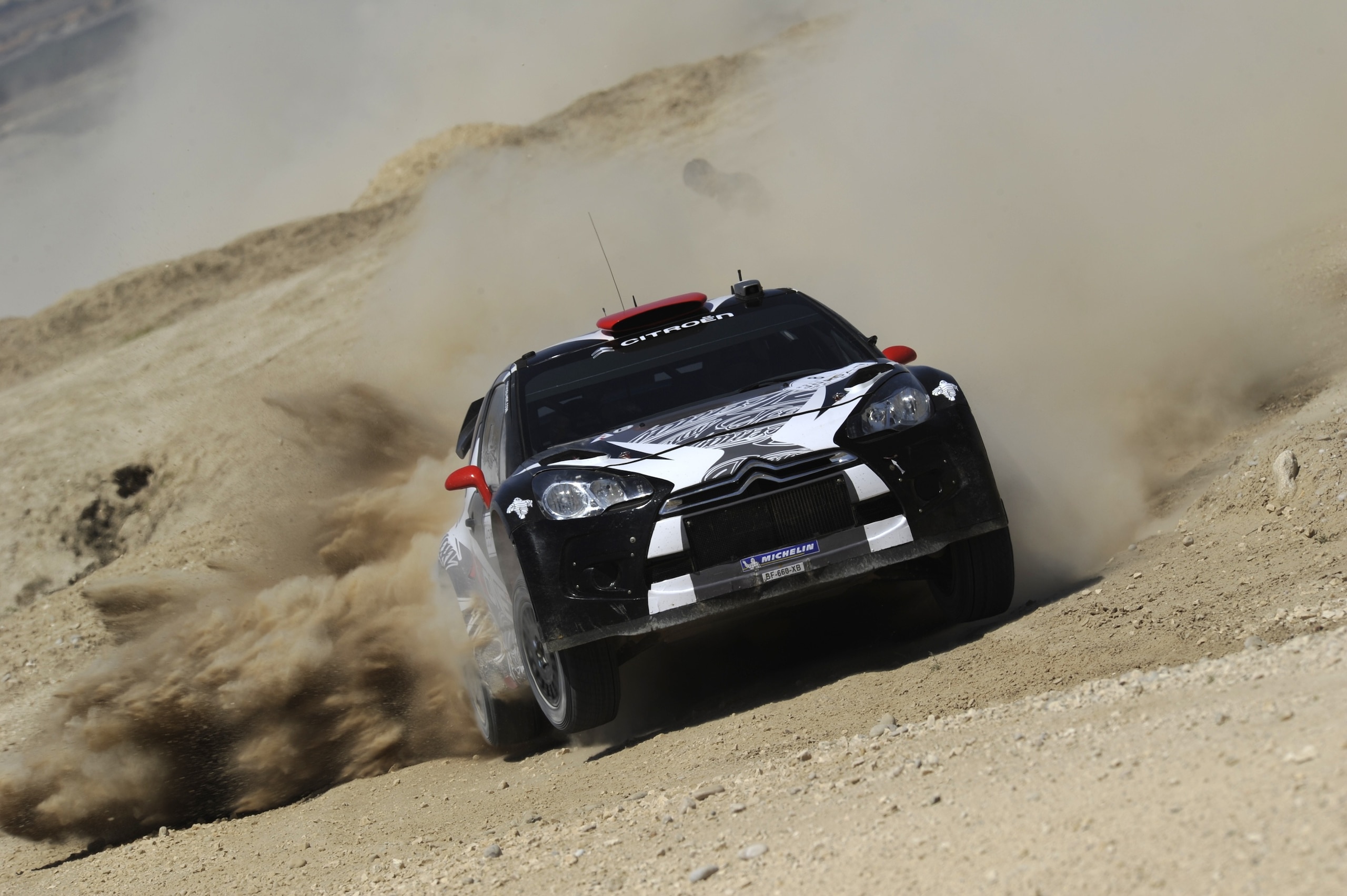 AMMAN, JORDAN - APRIL 15:  Kimi Raikkonen of Finland and Kaj Lindstrom of Finland compete in their Ice1 Racing WRT Citroen DS3 WRC during Day 1 of the WRC Rally Jordan on April 15, 2011 in Amman, Jordan.  (Photo by Massimo Bettiol/Getty Images)