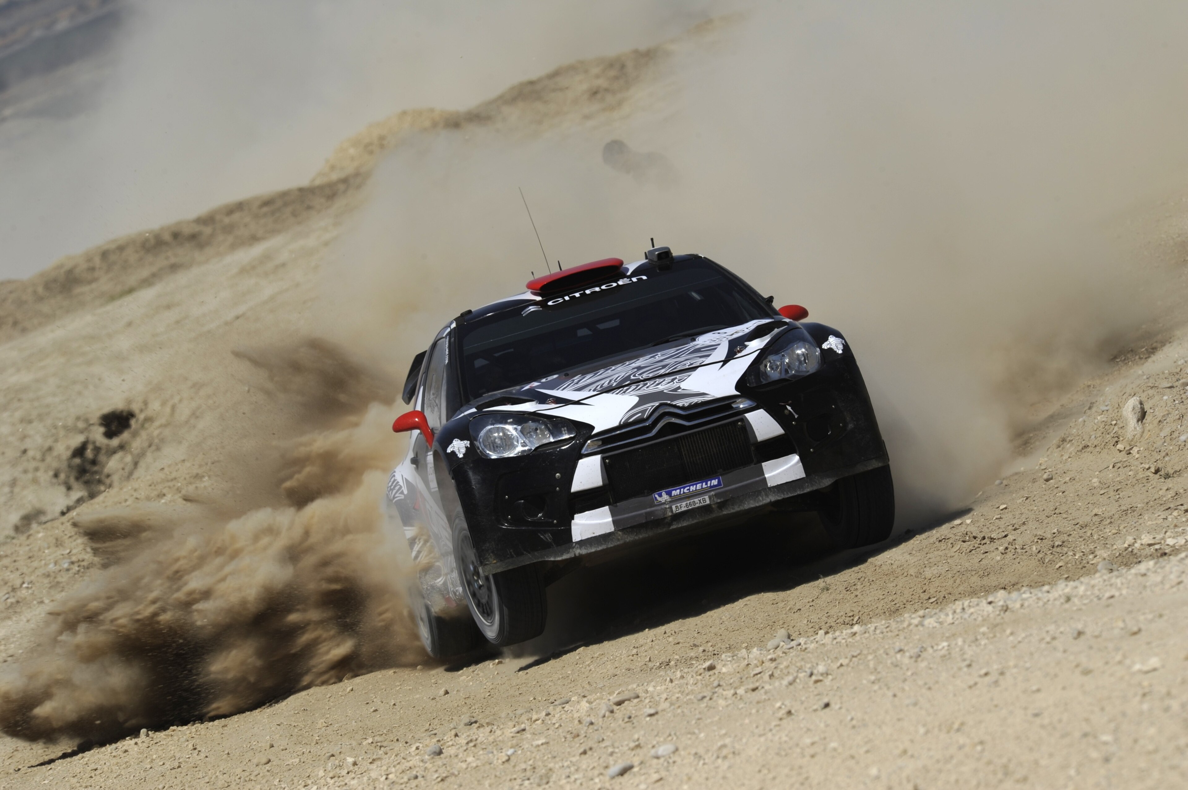 AMMAN, JORDAN - APRIL 15:  Kimi Raikkonen of Finland and Kaj Lindstrom of Finland compete in their Ice1 Racing WRT Citroen DS3 WRC during Day 1 of the WRC Rally Jordan on April 15, 2011 in Amman, Jordan.  (Photo by Massimo Bettiol/Getty Images)