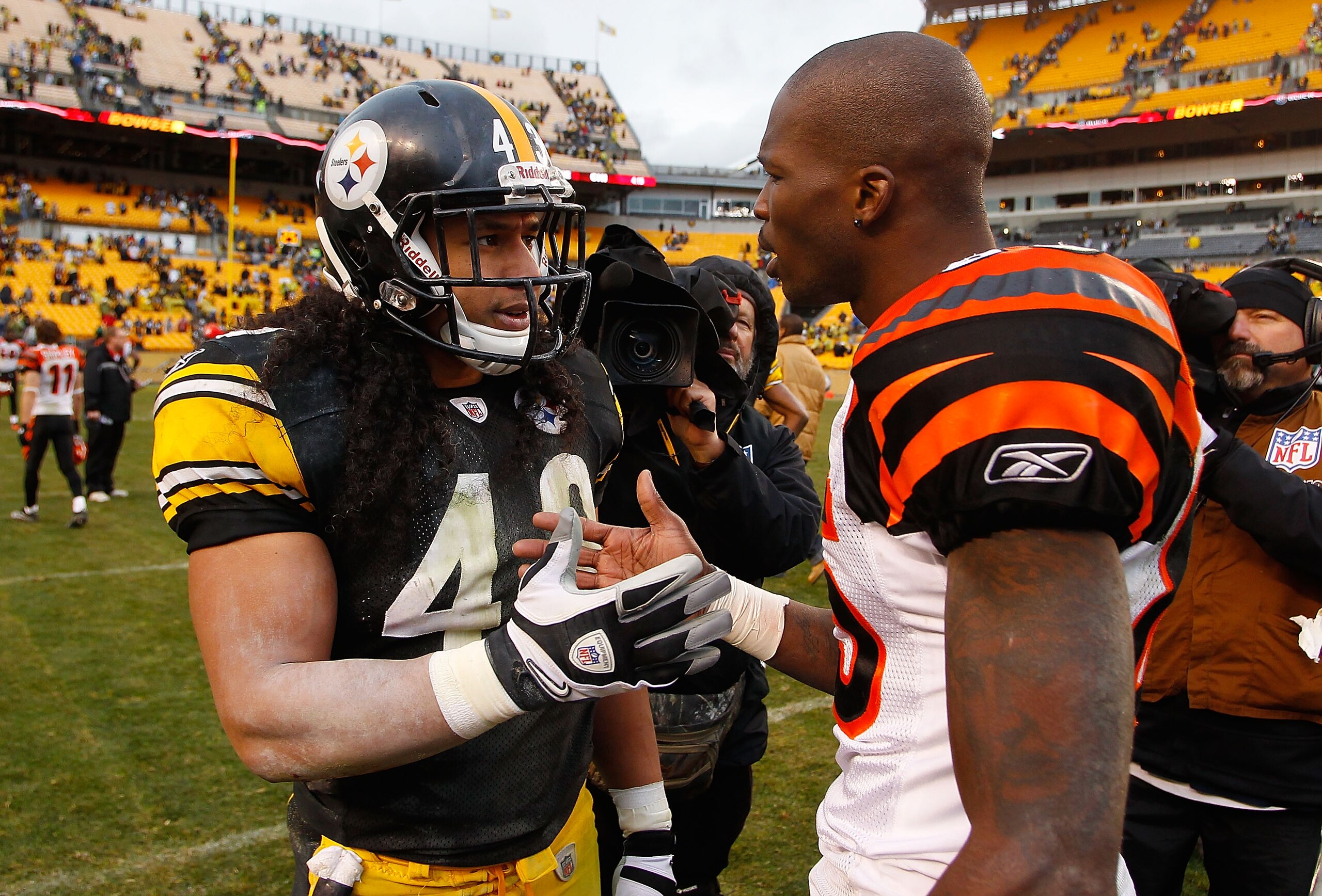 PITTSBURGH - DECEMBER 12:  Troy Polamalu #43 of the Pittsburgh Steelers talks with Chad Ochocinco #85 of the Cincinnati Bengals following the game on December 12, 2010 at Heinz Field in Pittsburgh, Pennsylvania.  (Photo by Jared Wickerham/Getty Images)