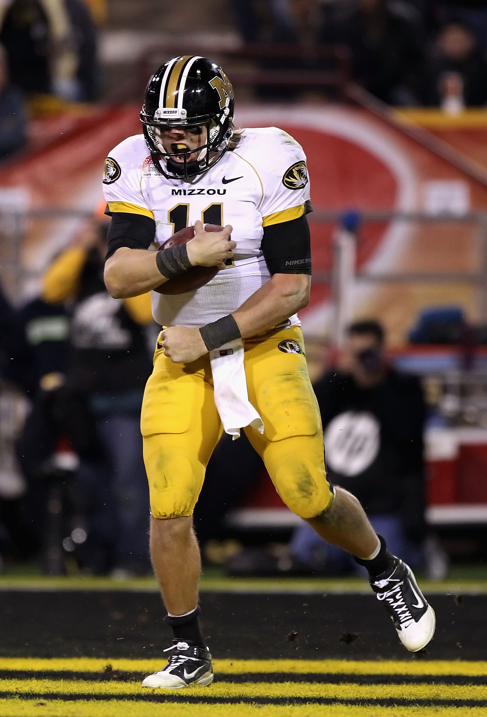 TEMPE, AZ - DECEMBER 28: Quarterback Blaine Gabbert #11 of the Missouri Tigers celebrates after scoring a 7 yard rushing touchdown against the Iowa Hawkeyes during the third quarter of the Insight Bowl at Sun Devil Stadium on December 28, 2010 in Tempe, TEMPE, AZ - DECEMBER 28: Quarterback Blaine Gabbert #11 of the Missouri Tigers celebrates after scoring a 7 yard rushing touchdown against the Iowa Hawkeyes during the third quarter of the Insight Bowl at Sun Devil Stadium on December 28, 2010 in Tempe,