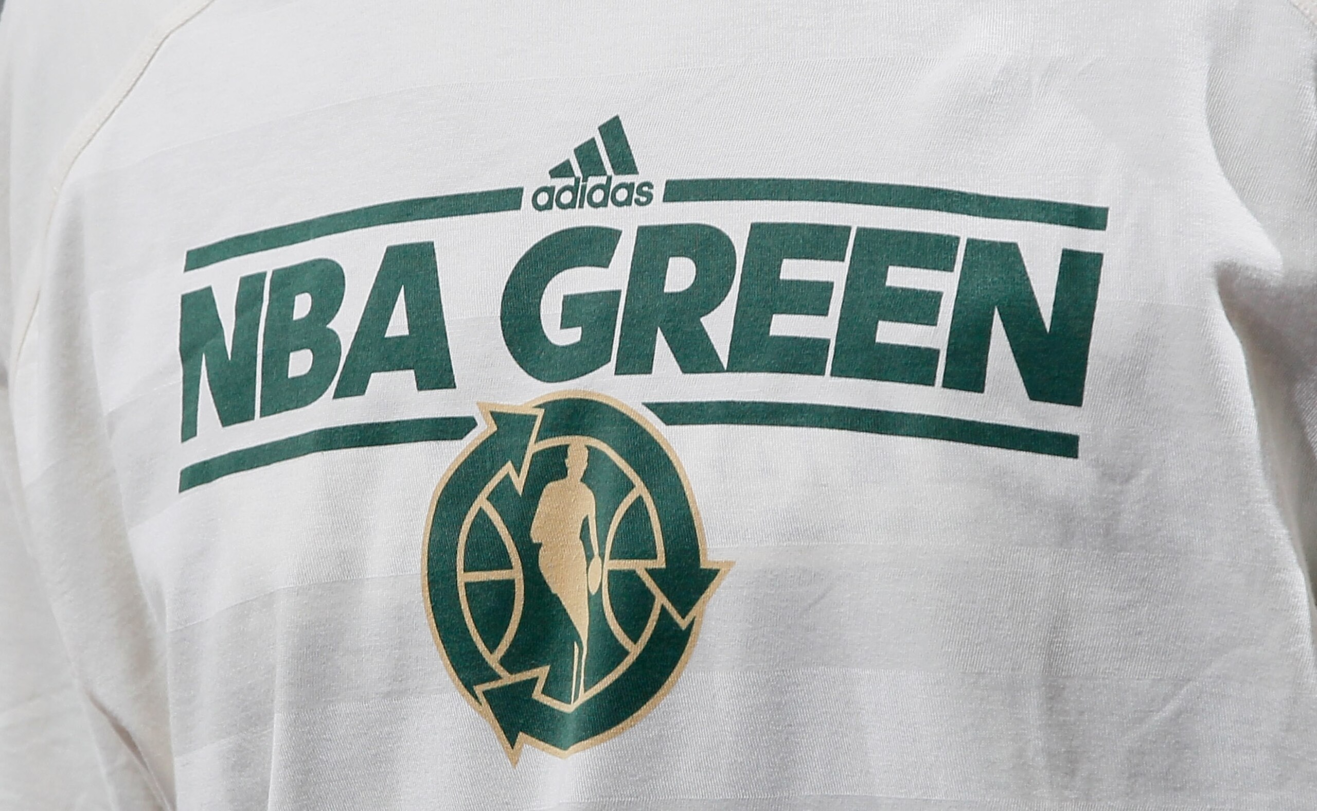 ATLANTA, GA - APRIL 05: Daniel Green #4 of the San Antonio Spurs wears a shirt promoting the NBA's recycling campaign during warmups before facing the Atlanta Hawks at Philips Arena on April 5, 2011 in Atlanta, Georgia. NOTE TO USER: User expressly ackn ATLANTA, GA - APRIL 05: Daniel Green #4 of the San Antonio Spurs wears a shirt promoting the NBA's recycling campaign during warmups before facing the Atlanta Hawks at Philips Arena on April 5, 2011 in Atlanta, Georgia. NOTE TO USER: User expressly ackn