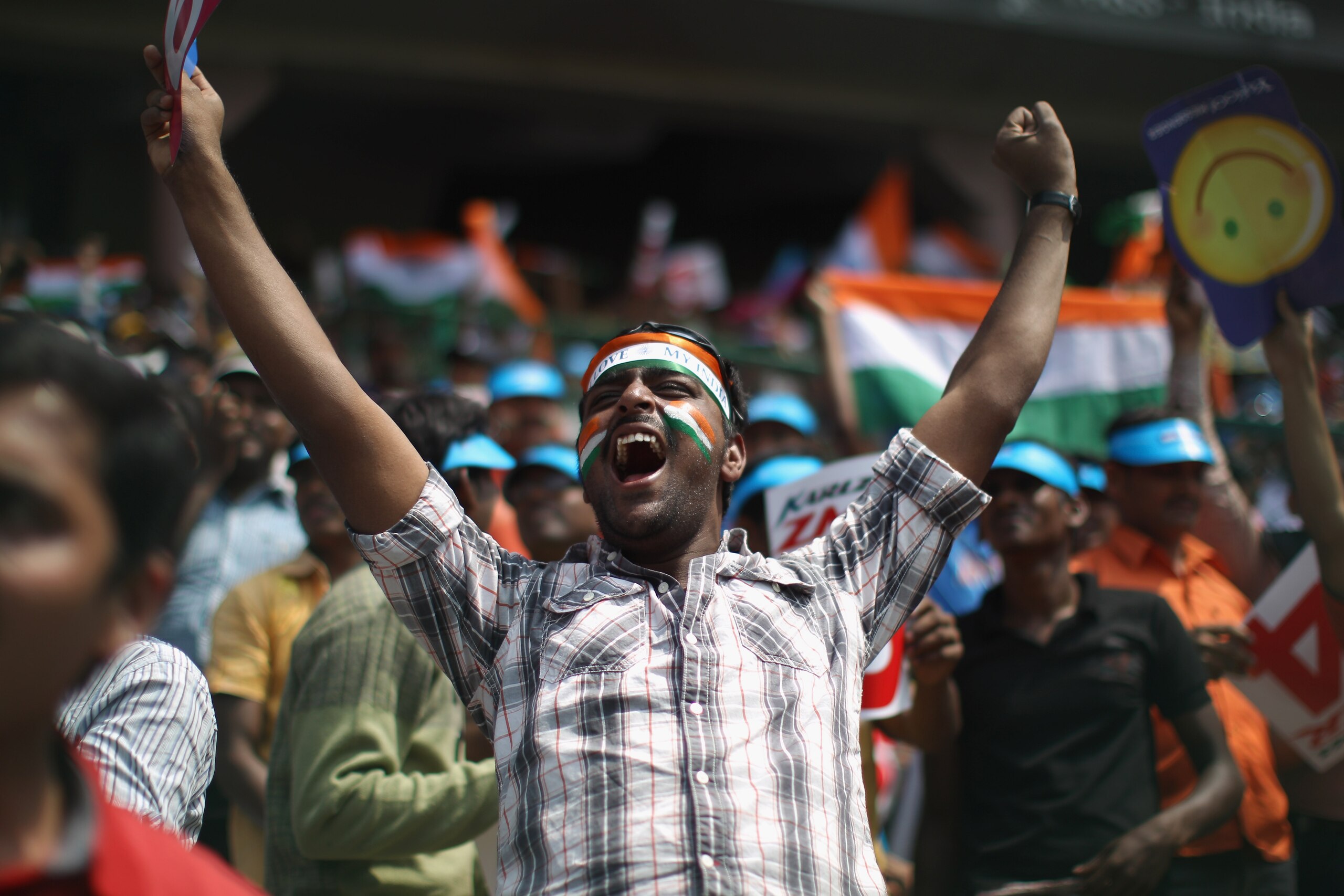 BANGALORE, INDIA - FEBRUARY 27: Fans get excited before the start of the match during the 2011 ICC World Cup Group B match between India and England at M. Chinnaswamy Stadium on February 27, 2011 in Bangalore, India. (Photo by Tom Shaw/Getty Images) BANGALORE, INDIA - FEBRUARY 27: Fans get excited before the start of the match during the 2011 ICC World Cup Group B match between India and England at M. Chinnaswamy Stadium on February 27, 2011 in Bangalore, India. (Photo by Tom Shaw/Getty Images)