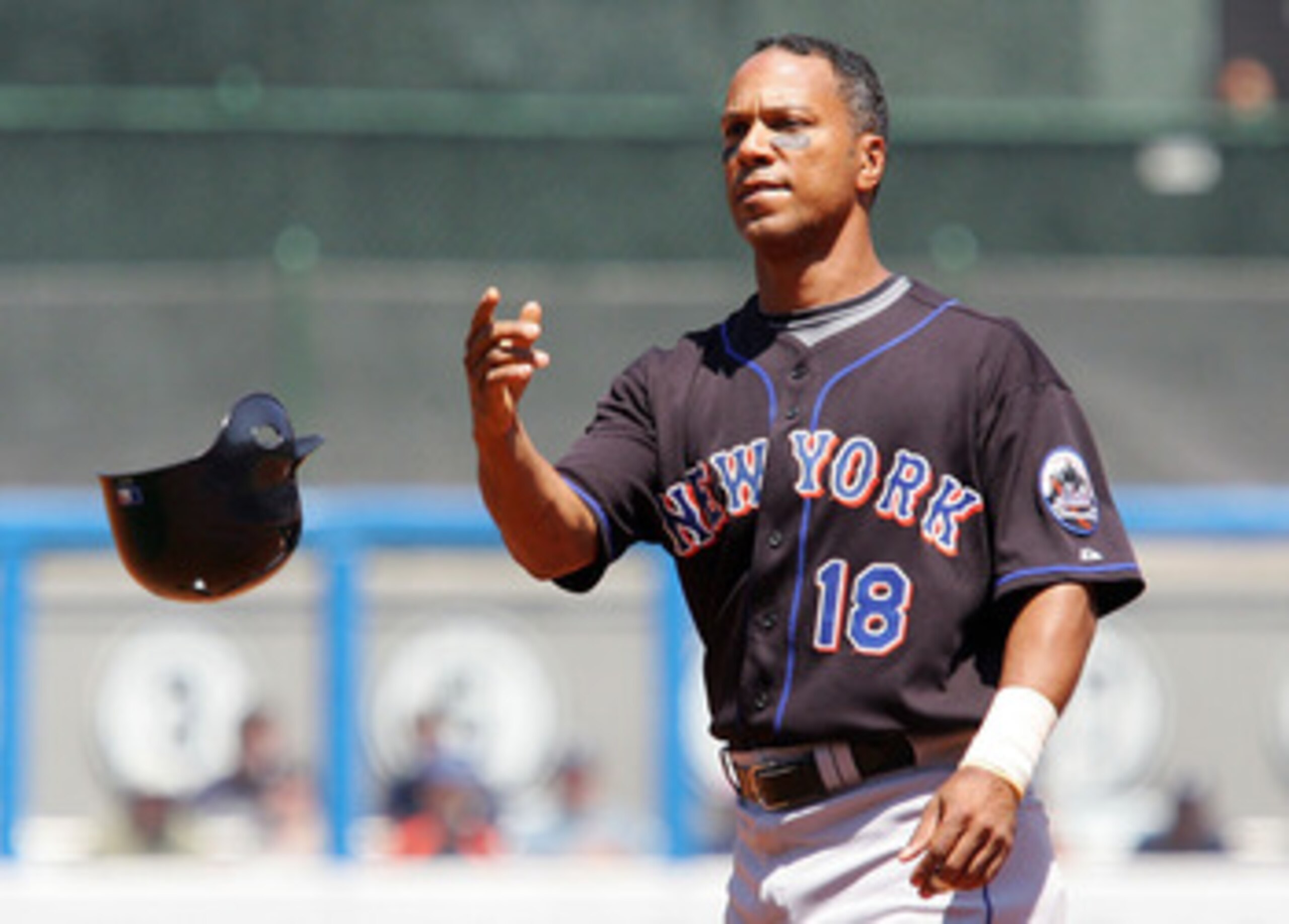 NEW YORK - MAY 17:  Moises Alou #18 of the New York Mets throws his helmet after being picked off in the second inning against the New York Yankees on May 17, 2008 at Yankee Stadium in the Bronx borough of New York City.  (Photo by Jim McIsaac/Getty Image