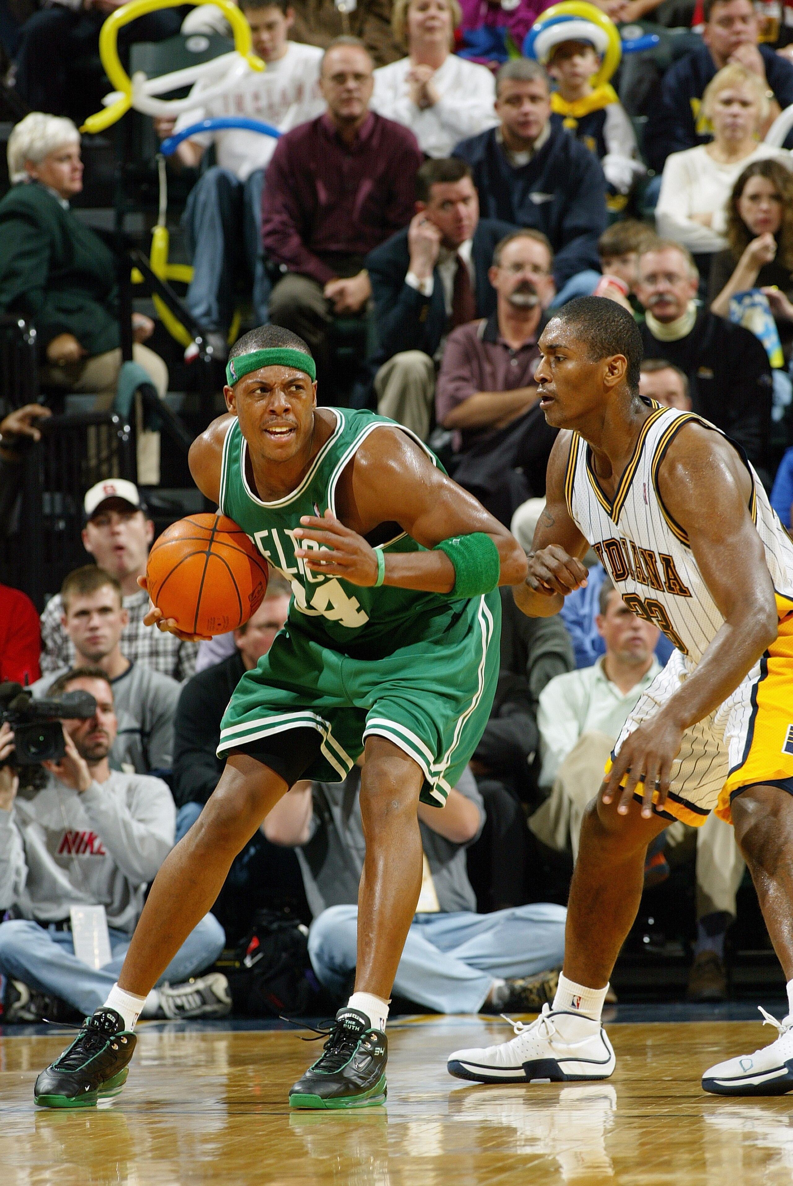 INDIANAPOLIS - NOVEMBER 11:  Paul Pierce #34 of the Boston Celtics looks to play the ball against Ron Artest #23 of the Indiana Pacers during the game at Conseco Fieldhouse on November 11, 2003 in Indianapolis, Indiana.  The Celtics won 78-76.  NOTE TO US
