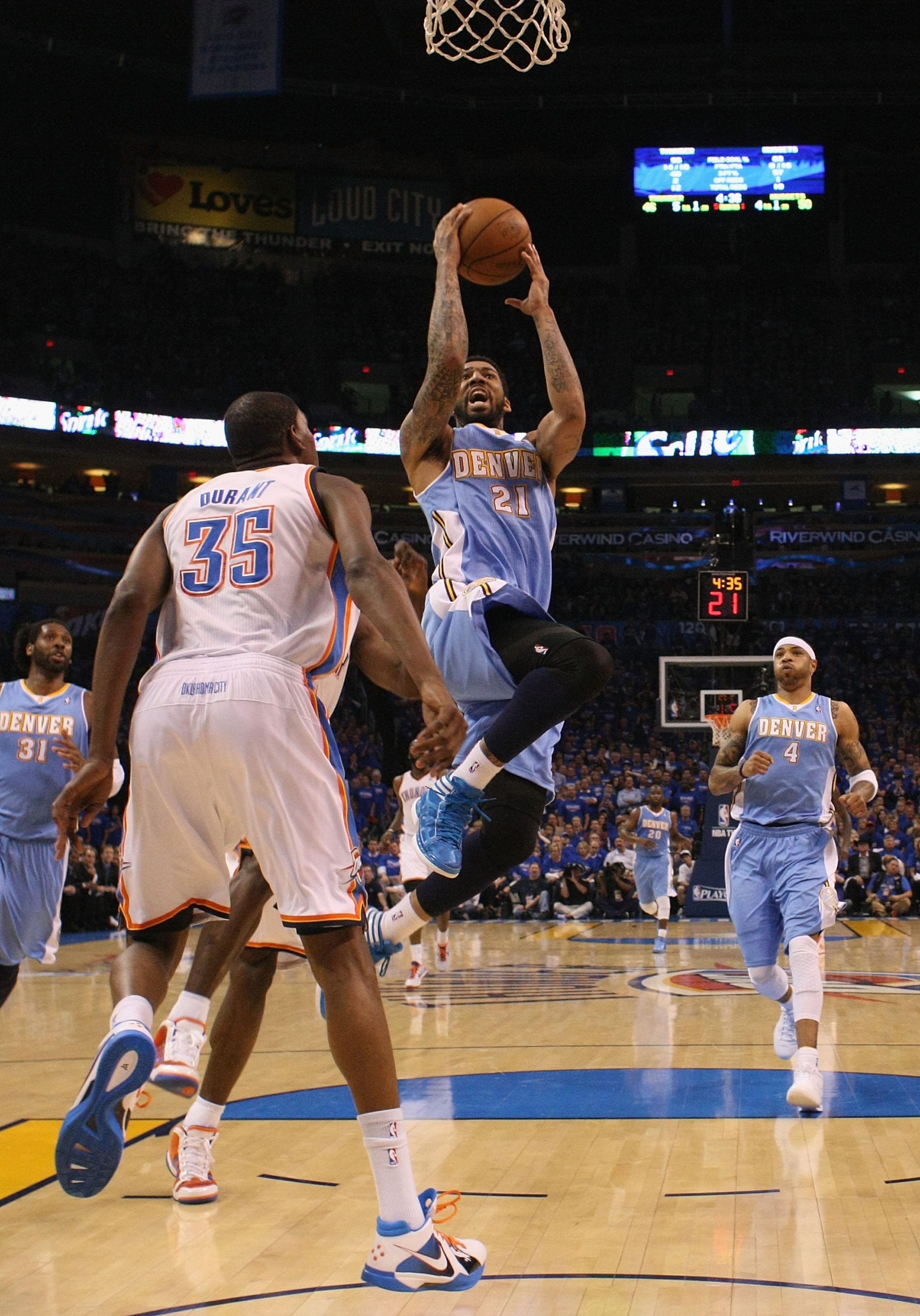 OKLAHOMA CITY, OK - APRIL 17: Wilson Chandler #21 of the Denver Nuggets drives to the basket against the Oklahoma City Thunder in Game One of the Western Conference Quarterfinals in the 2011 NBA Playoffs on April 17, 2011 at the Ford Center in Oklahoma Ci