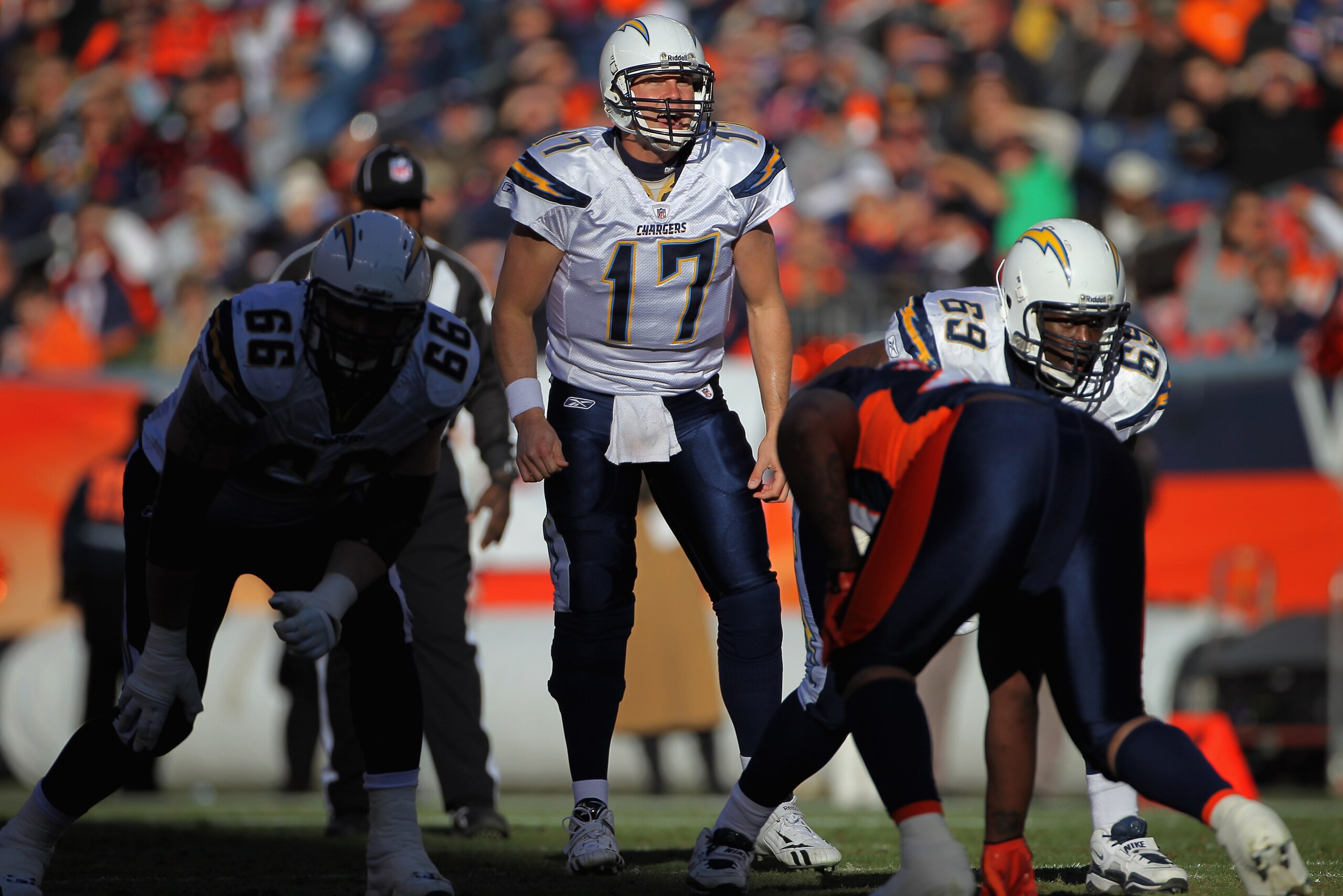 DENVER - JANUARY 02:  Quarterback Philip Rivers #17 of the San Diego Chargers runs the offense against the Denver Broncos at INVESCO Field at Mile High on January 2, 2011 in Denver, Colorado. The Chargers defeated the Broncos 33-28.  (Photo by Doug Pensin