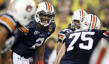 GLENDALE, AZ - JANUARY 10:  Cameron Newton #2 of the Auburn Tigersc reacts with his team against the Oregon Ducks during the Tostitos BCS National Championship Game at University of Phoenix Stadium on January 10, 2011 in Glendale, Arizona.  (Photo by Chri