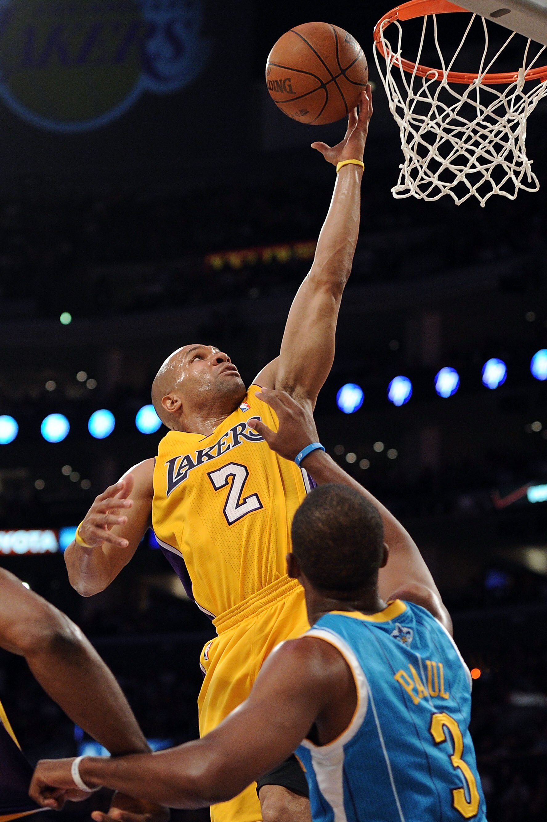 LOS ANGELES, CA - APRIL 20:  Derek Fisher #2 of the Los Angeles Lakers shoots over Chris Paul #3 of the New Orleans Hornets in the first quarter in Game Two of the Western Conference Quarterfinals in the 2011 NBA Playoffs on April 20, 2011 at Staples Cent