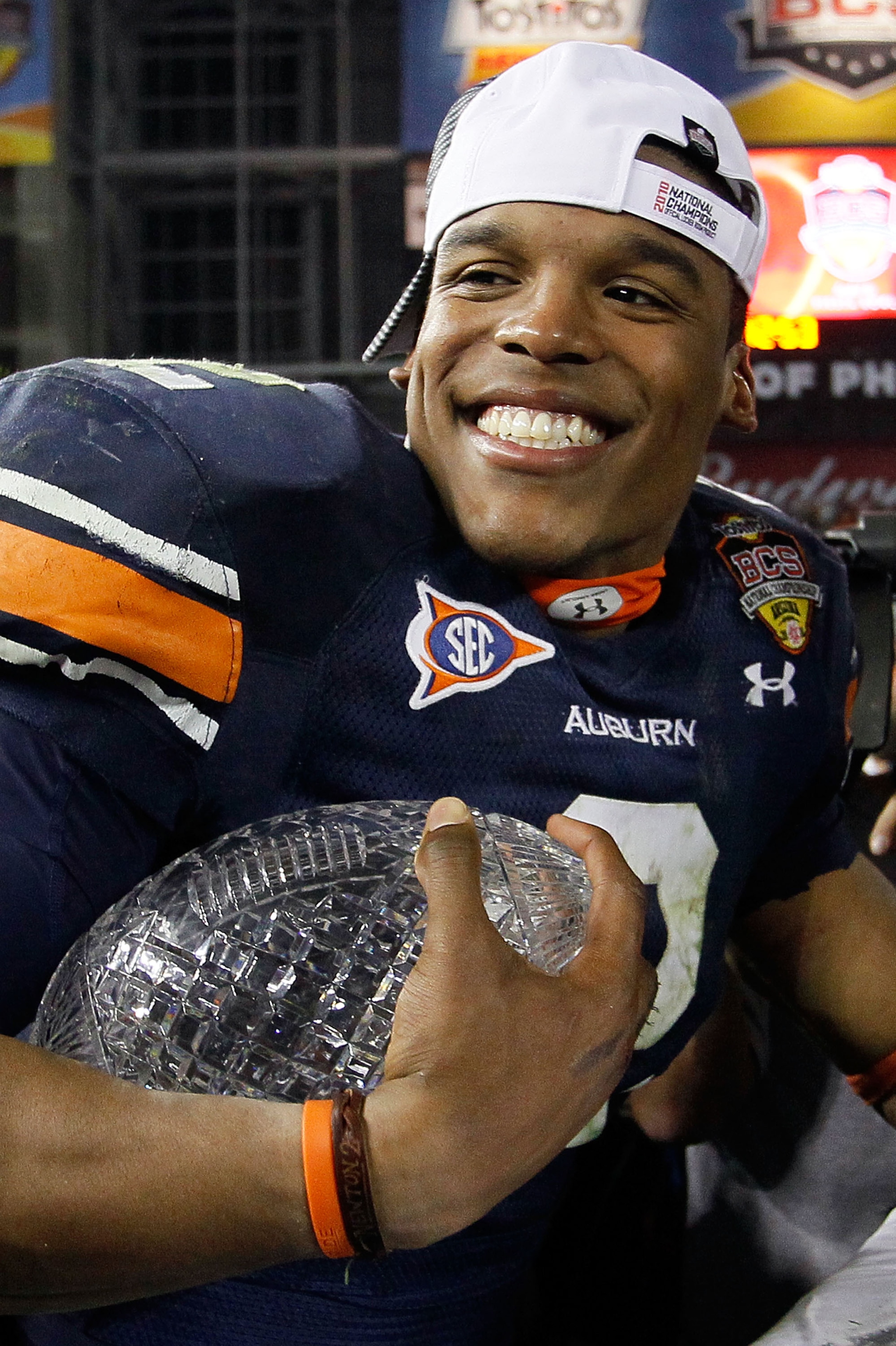 GLENDALE, AZ - JANUARY 10: Quarterback Cameron Newton #2 of the Auburn Tigers celebrates the Tigers 22-19 victory against the Oregon Ducks in the Tostitos BCS National Championship Game at University of Phoenix Stadium on January 10, 2011 in Glendale, Ar GLENDALE, AZ - JANUARY 10: Quarterback Cameron Newton #2 of the Auburn Tigers celebrates the Tigers 22-19 victory against the Oregon Ducks in the Tostitos BCS National Championship Game at University of Phoenix Stadium on January 10, 2011 in Glendale, Ar