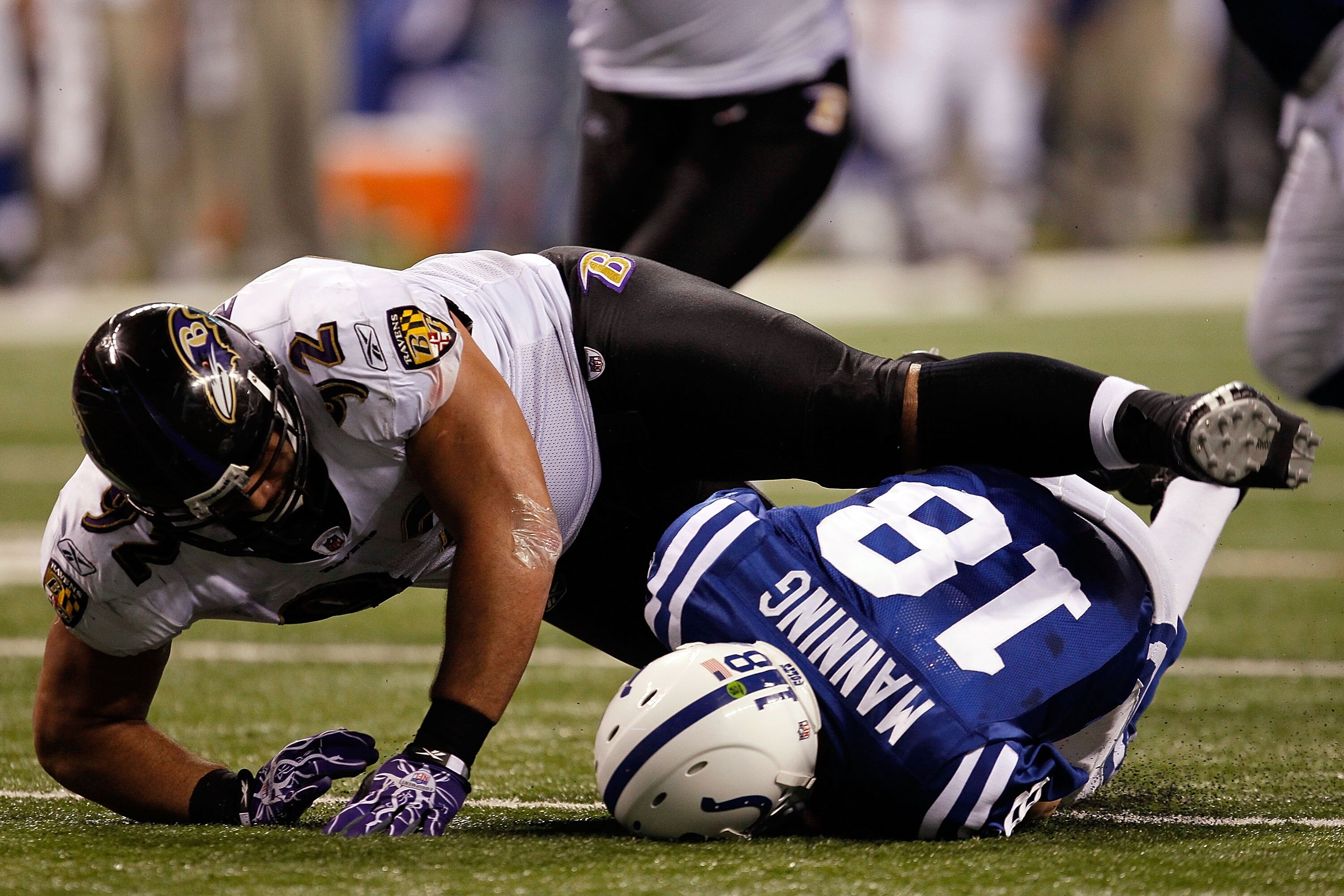INDIANAPOLIS - JANUARY 16:  Peyton Manning #18 of the Indianapolis Colts is sacked by Haloti Ngata #92 of the Baltimore Ravens in the third quarter of the AFC Divisional Playoff Game at Lucas Oli Stadium on January 16, 2010 in Indianapolis, Indiana.  (Pho