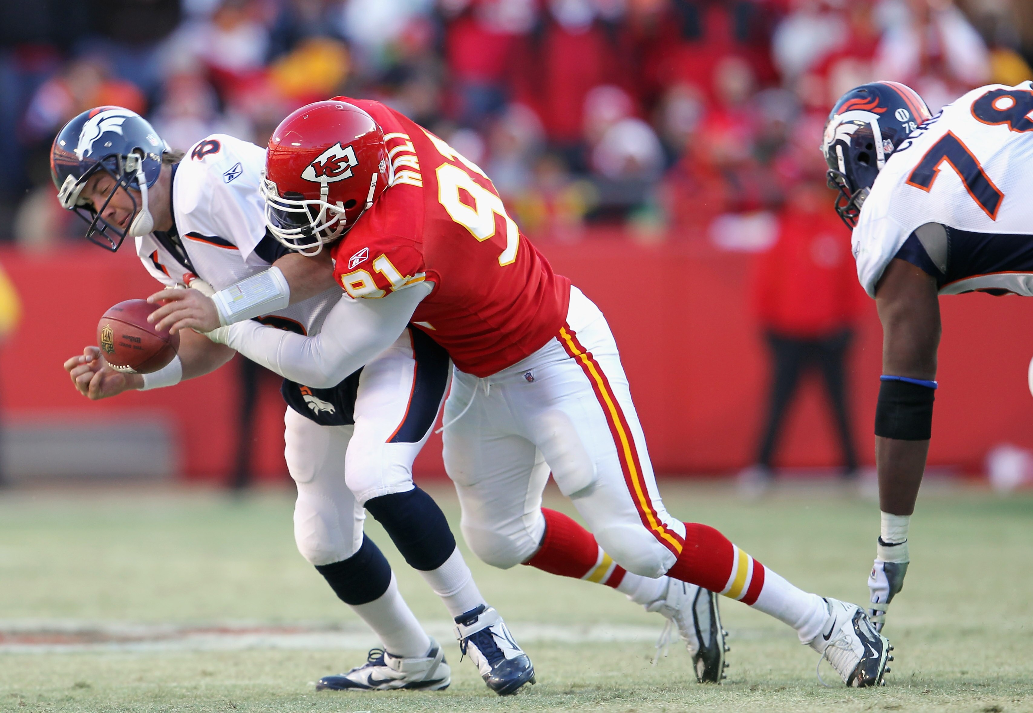KANSAS CITY, MO - DECEMBER 05:  Tamba Hali #91 of the Kansas City Chiefs sacks quarterback Kyle Orton #8 of the Denver Broncos during the game on December 5, 2010 at Arrowhead Stadium in Kansas City, Missouri.  (Photo by Jamie Squire/Getty Images)