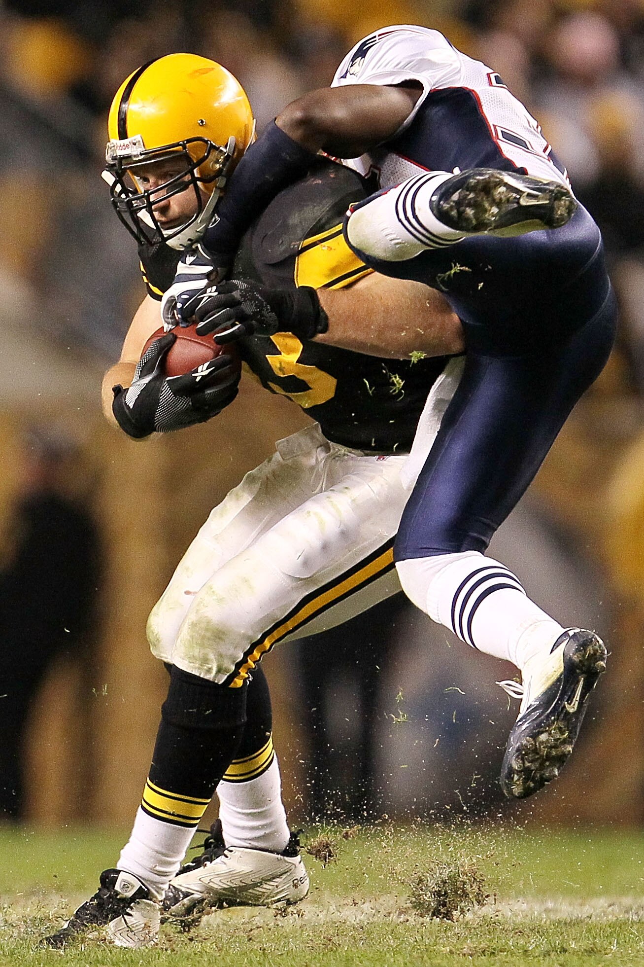PITTSBURGH - NOVEMBER 14: Heath Miller #83  of the Pittsburgh Steelers is tackled by James Sanders #36 of the New England Patriots on November 14, 2010 at Heinz Field in Pittsburgh, Pennsylvania.  (Photo by Chris McGrath/Getty Images)