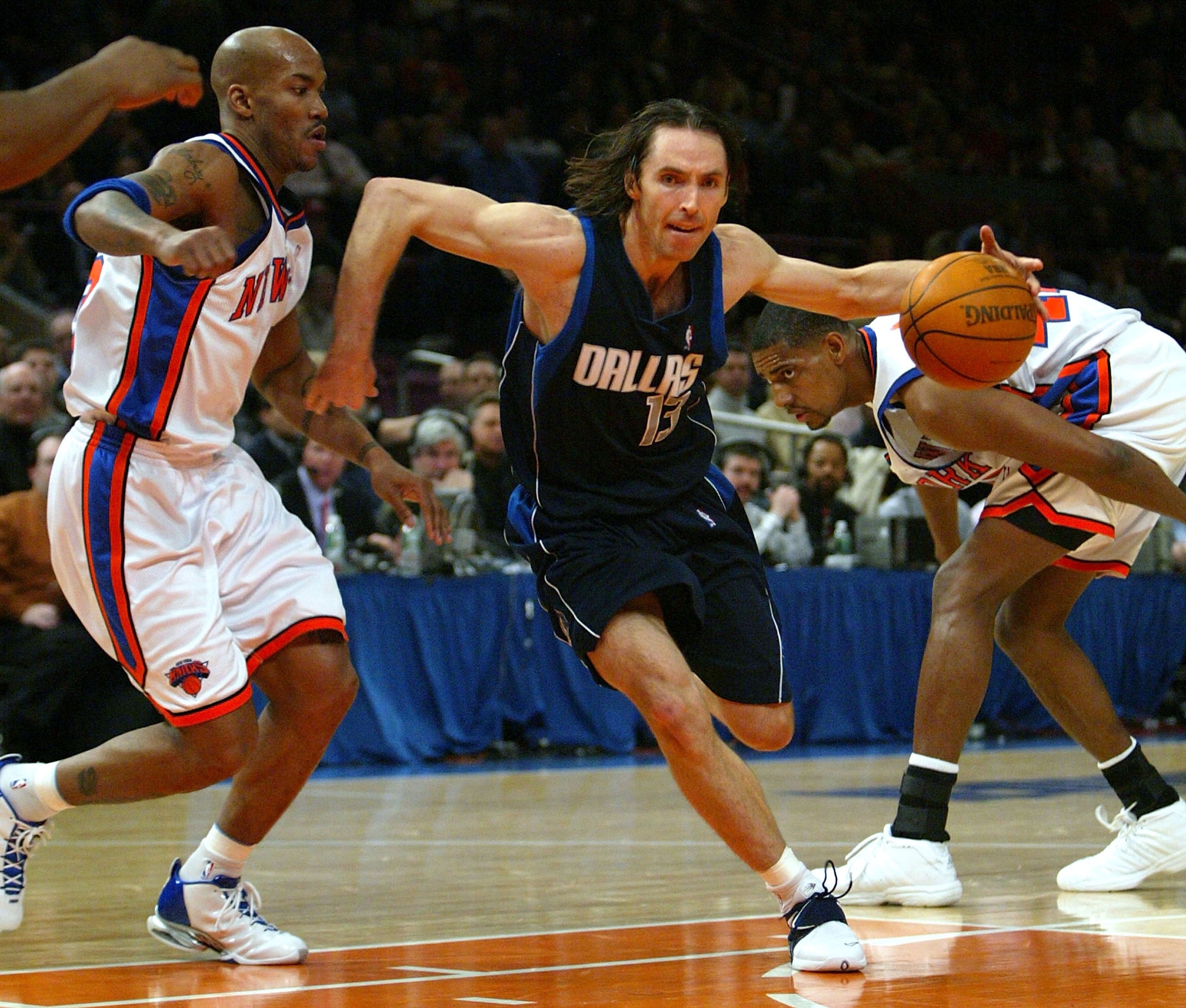 NEW YORK CITY - JANUARY 12: Steve Nash #13 of the Dallas Mavericks drives past Stephon Marbury #3 and Kurt Thomas #40 of the New York Knicks on January 12, 2004 at Madison Square Garden in New York City. NOTE TO USER: User expressly acknowledges that, by NEW YORK CITY - JANUARY 12: Steve Nash #13 of the Dallas Mavericks drives past Stephon Marbury #3 and Kurt Thomas #40 of the New York Knicks on January 12, 2004 at Madison Square Garden in New York City. NOTE TO USER: User expressly acknowledges that, by