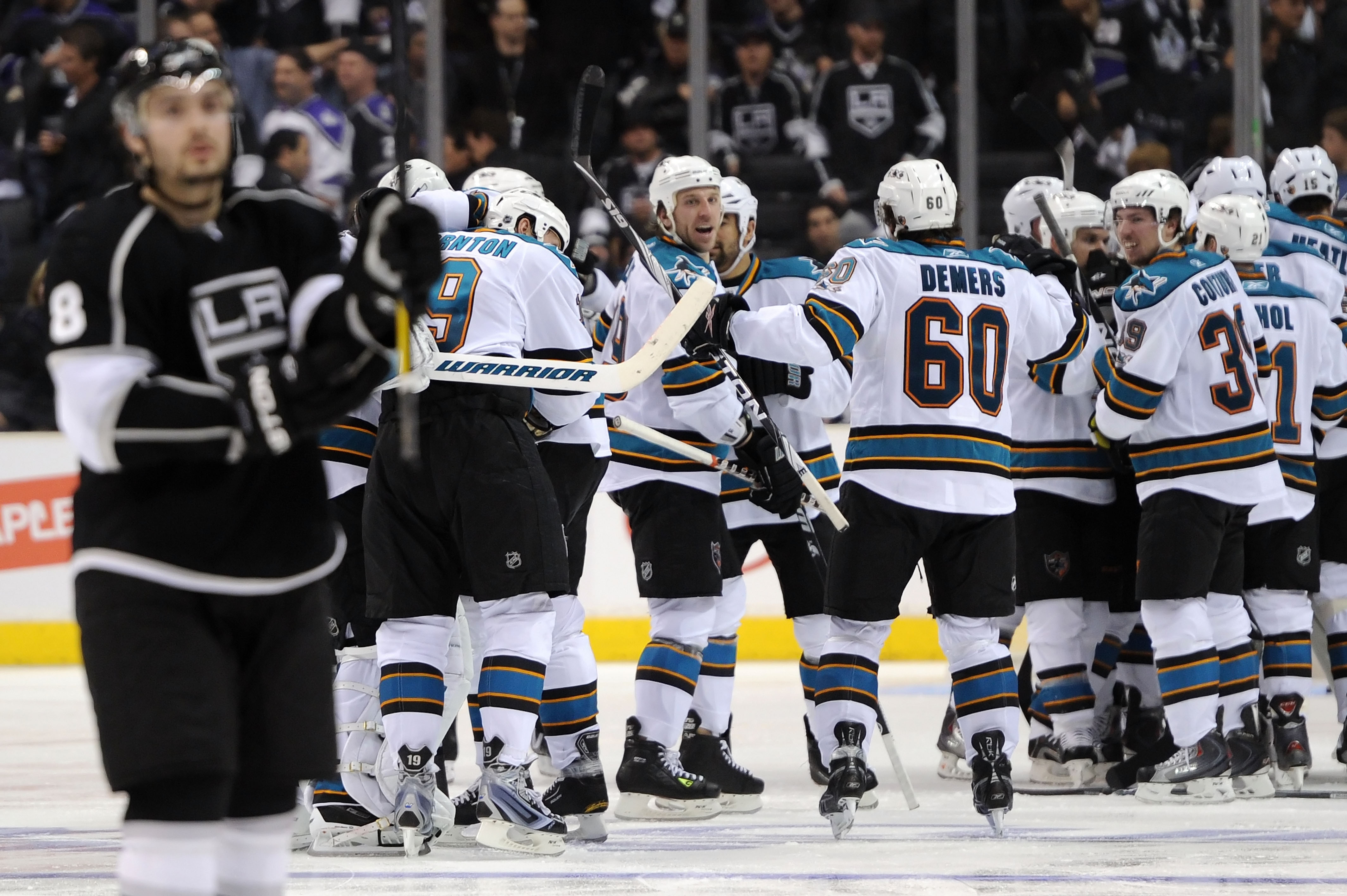LOS ANGELES, CA - APRIL 19: The San Jose Sharks celebrate after defeating the Los Angeles Kings 6-5 in overtime of game three of the Western Conference Quarterfinals during the 2011 NHL Stanley Cup Playoffs at Staples Center on April 19, 2011 in Los Ange LOS ANGELES, CA - APRIL 19: The San Jose Sharks celebrate after defeating the Los Angeles Kings 6-5 in overtime of game three of the Western Conference Quarterfinals during the 2011 NHL Stanley Cup Playoffs at Staples Center on April 19, 2011 in Los Ange