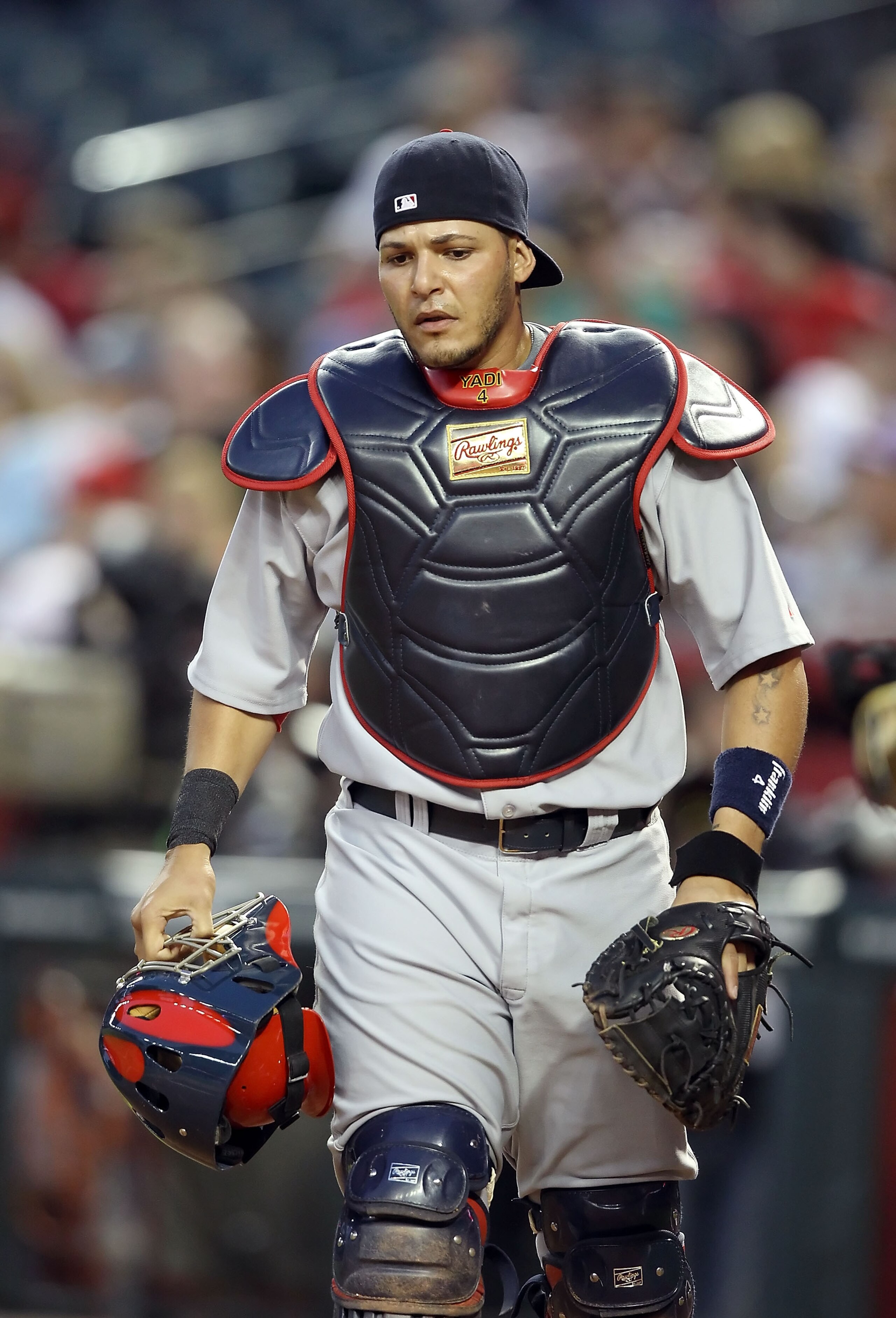 PHOENIX, AZ - APRIL 12:  Catcher Yadier Molina #4 of the St. Louis Cardinals in action during the Major League Baseball game against the Arizona Diamondbacks at Chase Field on April 12, 2011 in Phoenix, Arizona.  The Diamondbacks defeated the Cardinals 13