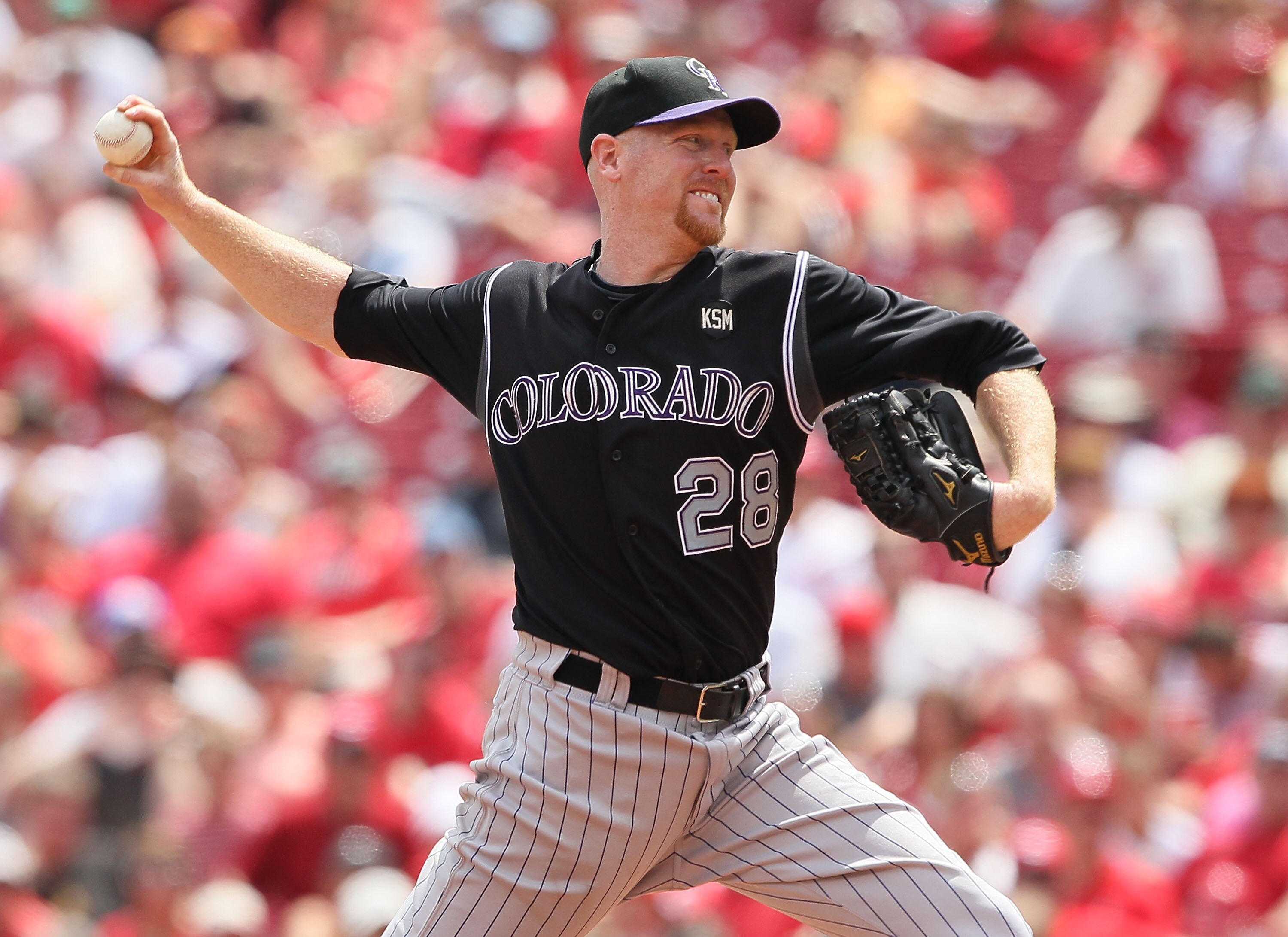 CINCINNATI - JULY 18:  Aaron Cook #28 of the Colorado Rockies throws a pitch during the game against the Cincinnati Reds at Great American Ball Park on July 18, 2010 in Cincinnati, Ohio.  (Photo by Andy Lyons/Getty Images)