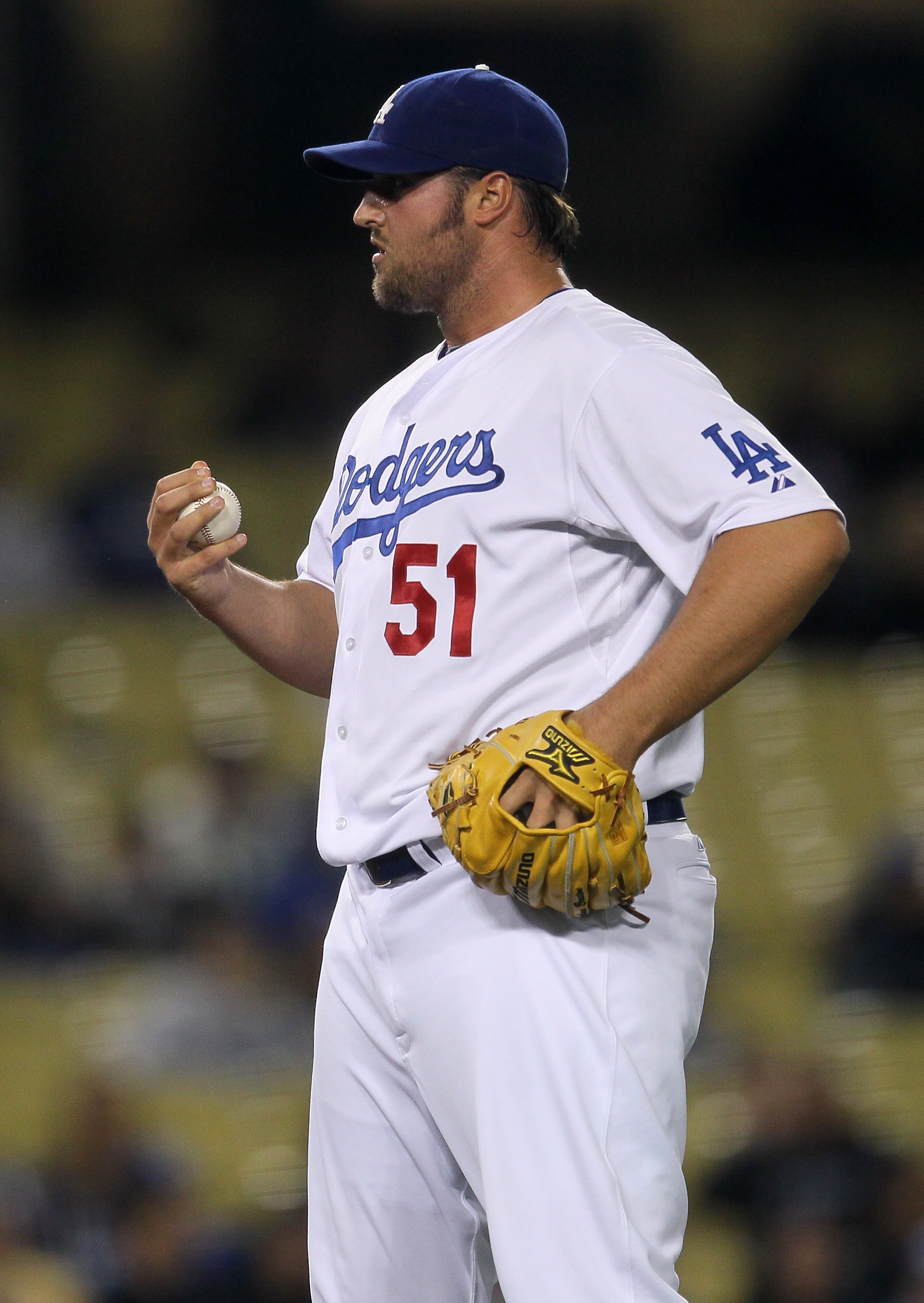 LOS ANGELES, CA - APRIL 18:  Pitcher Jonathan Broxton #51 of the Los Angeles Dodgers reacts during a ninth inning rally by the Atlanta Braves on April 18, 2011 at Dodger Stadium in Los Angeles, California.  The Dodgers won 4-2.  (Photo by Stephen Dunn/Get
