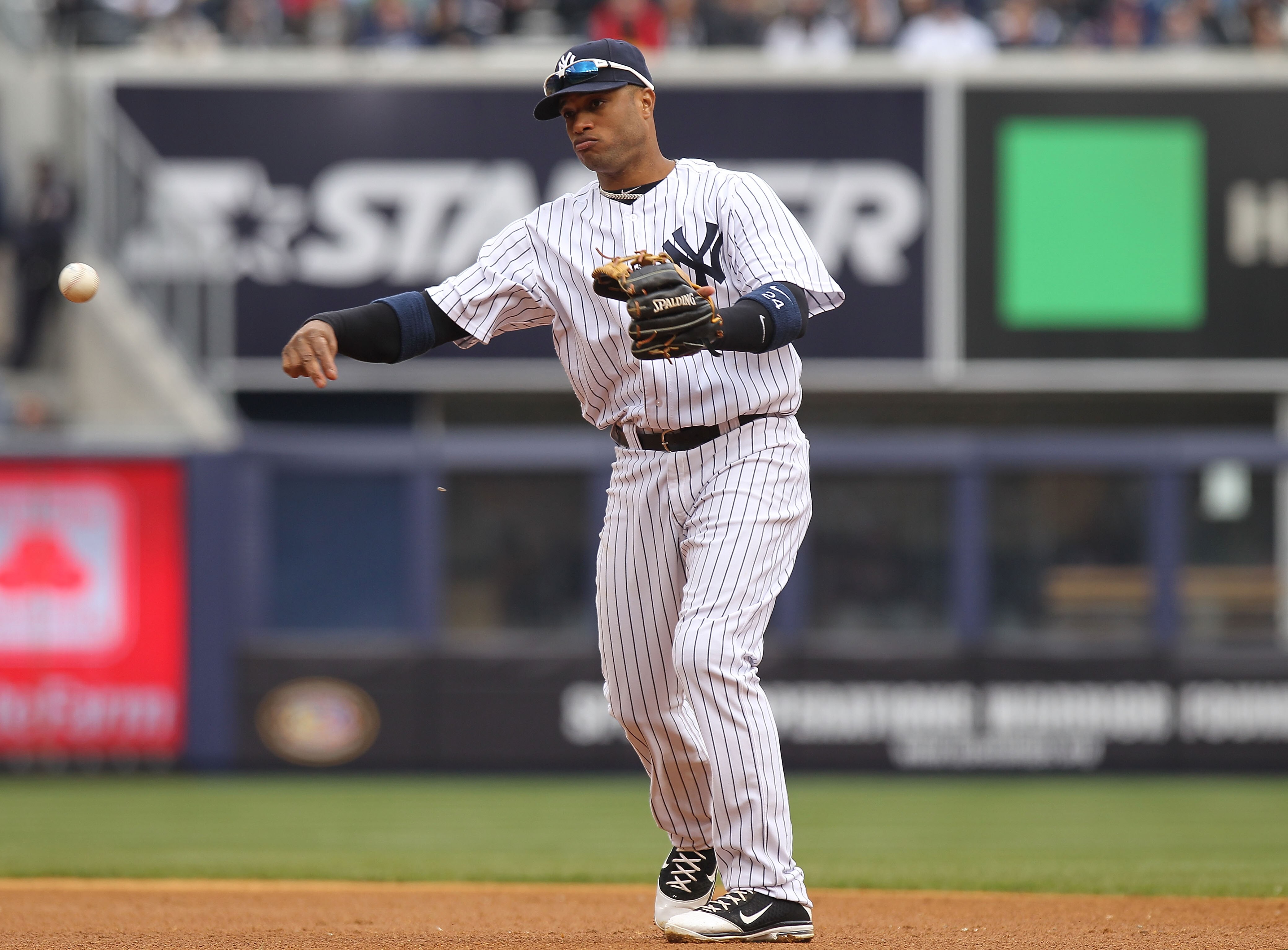 NEW YORK, NY - APRIL 07:  Robinson Cano #24 of the New York Yankees against the Minnesota Twins at Yankee Stadium on April 7, 2011 in the Bronx borough of New York City.  (Photo by Nick Laham/Getty Images)