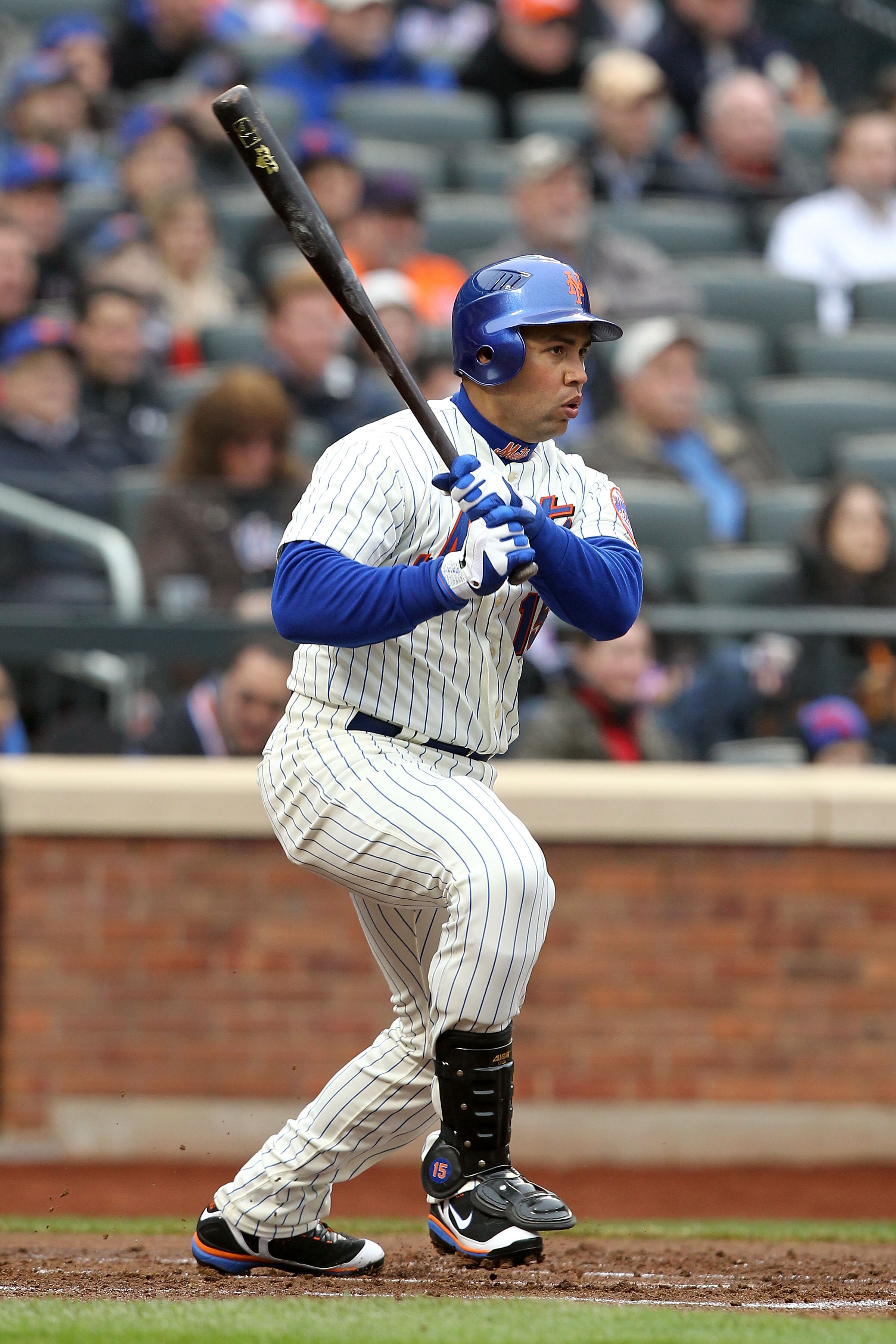 NEW YORK, NY - APRIL 08:  Carlos Beltran #15 of the New York Mets bats against the Washington Nationals during the Mets' Home Opener at Citi Field on April 8, 2011 in the Flushing neighborhood of Queens in New York City. The Nationals won 6-2.  (Photo by