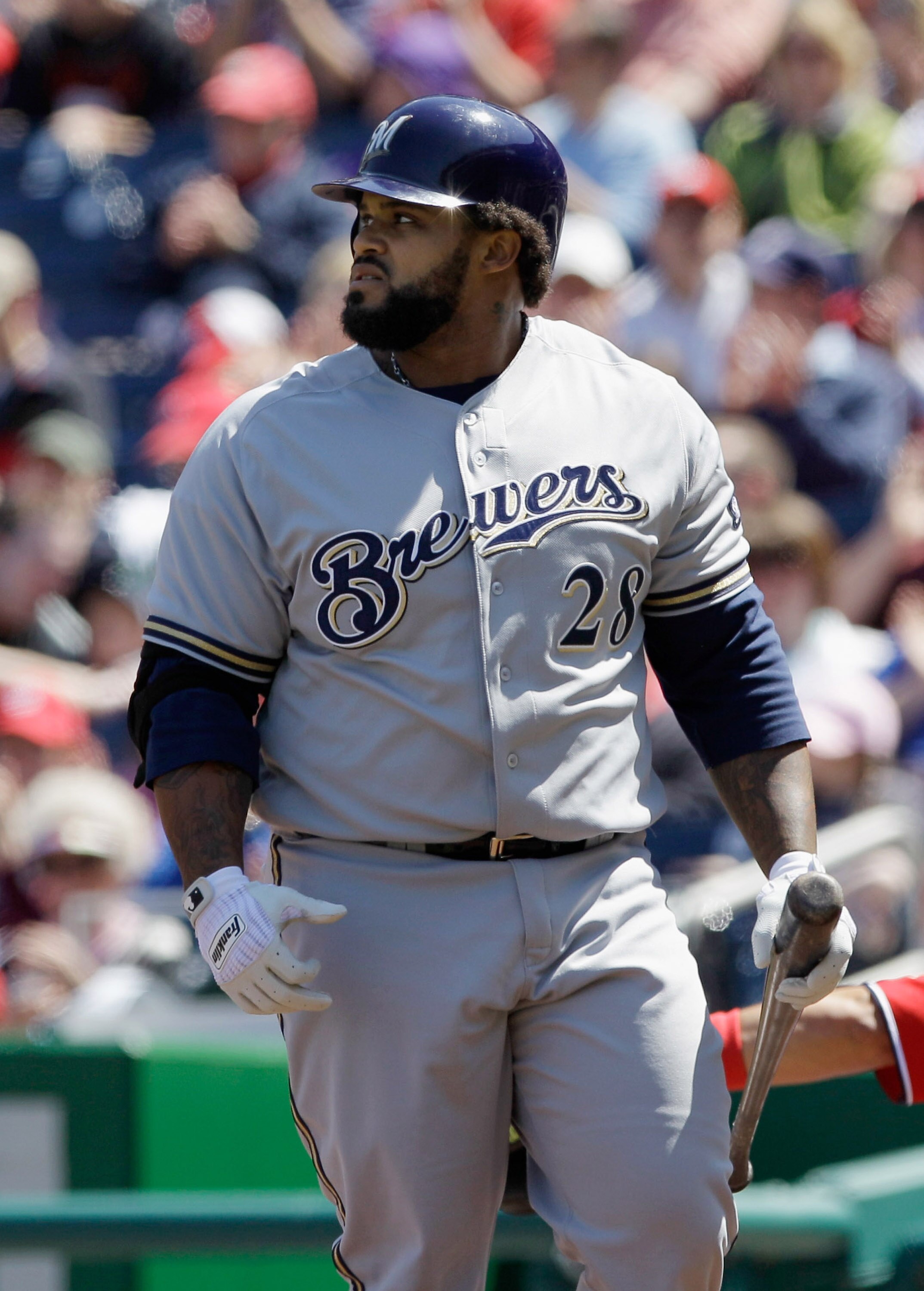 WASHINGTON, DC - APRIL 17: Prince Fielder #28 of the Milwaukee Brewers walks back to the dugout after striking out in the first inning of game one of a double header against the Washington Nationals at Nationals Park on April 17, 2011 in Washington, DC.