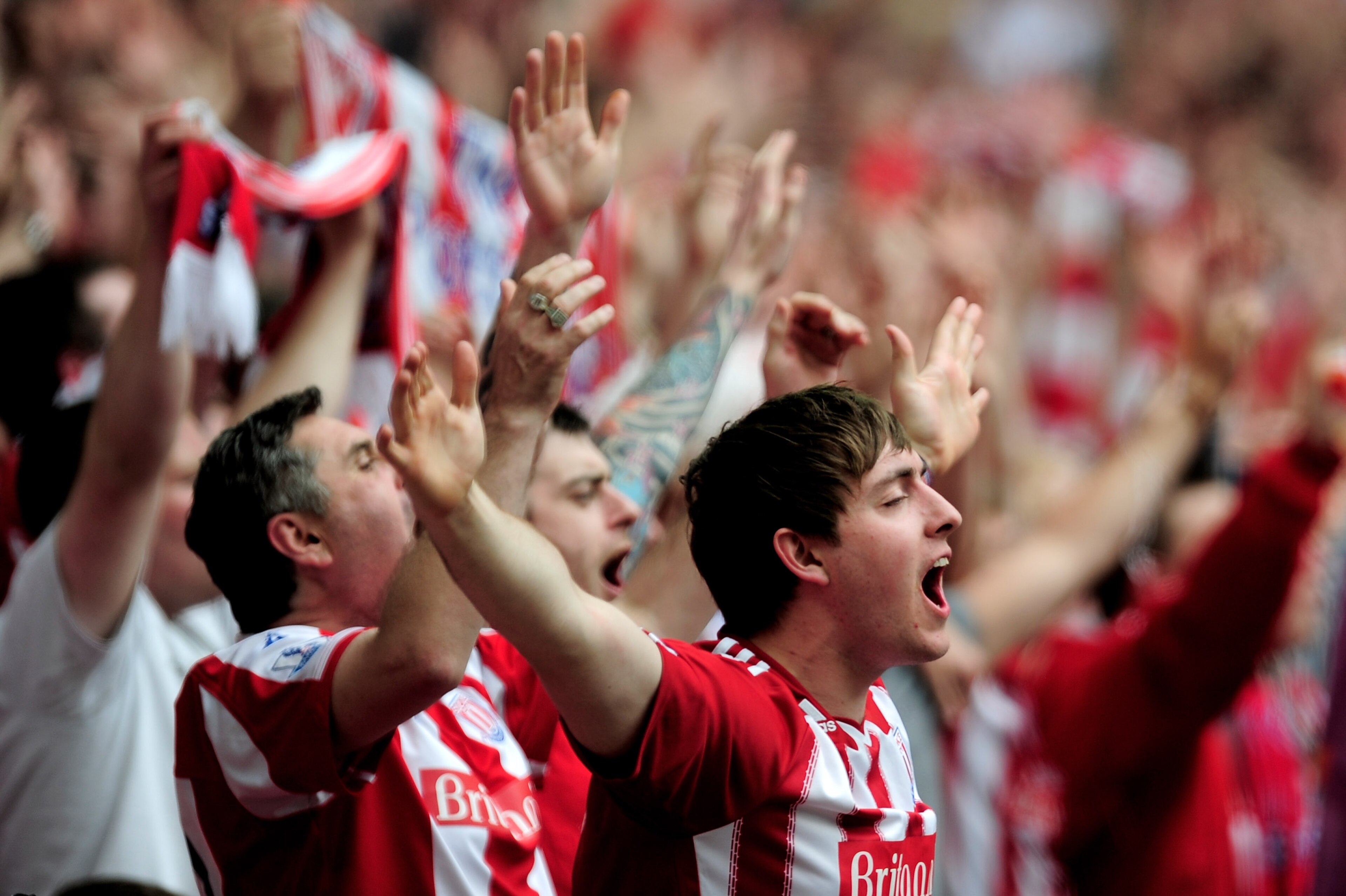 LONDON, ENGLAND - APRIL 17:  Stoke fans sing during the FA Cup sponsored by E.ON semi final match between Bolton Wanderers and Stoke City at Wembley Stadium on April 17, 2011 in London, England.  (Photo by Jamie McDonald/Getty Images)