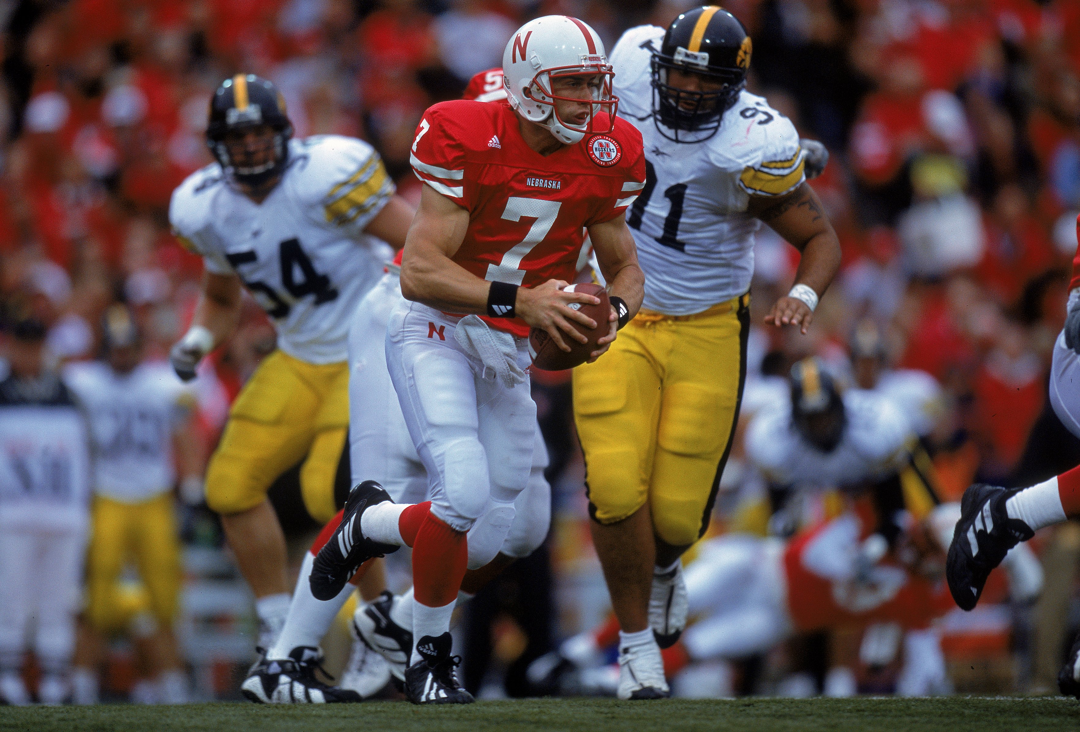 23 Sep 2000: Quarterback Eric Crouch #7 of the Nebraska Cornhuskers scrambles with the ball during the game against the Iowa Hawkeyes at the Memorial Stadium in Lincoln, Nebraska. The Cornhuskers defeated the Hawkeyes 42-13.Mandatory Credit: Brian Bahr  /