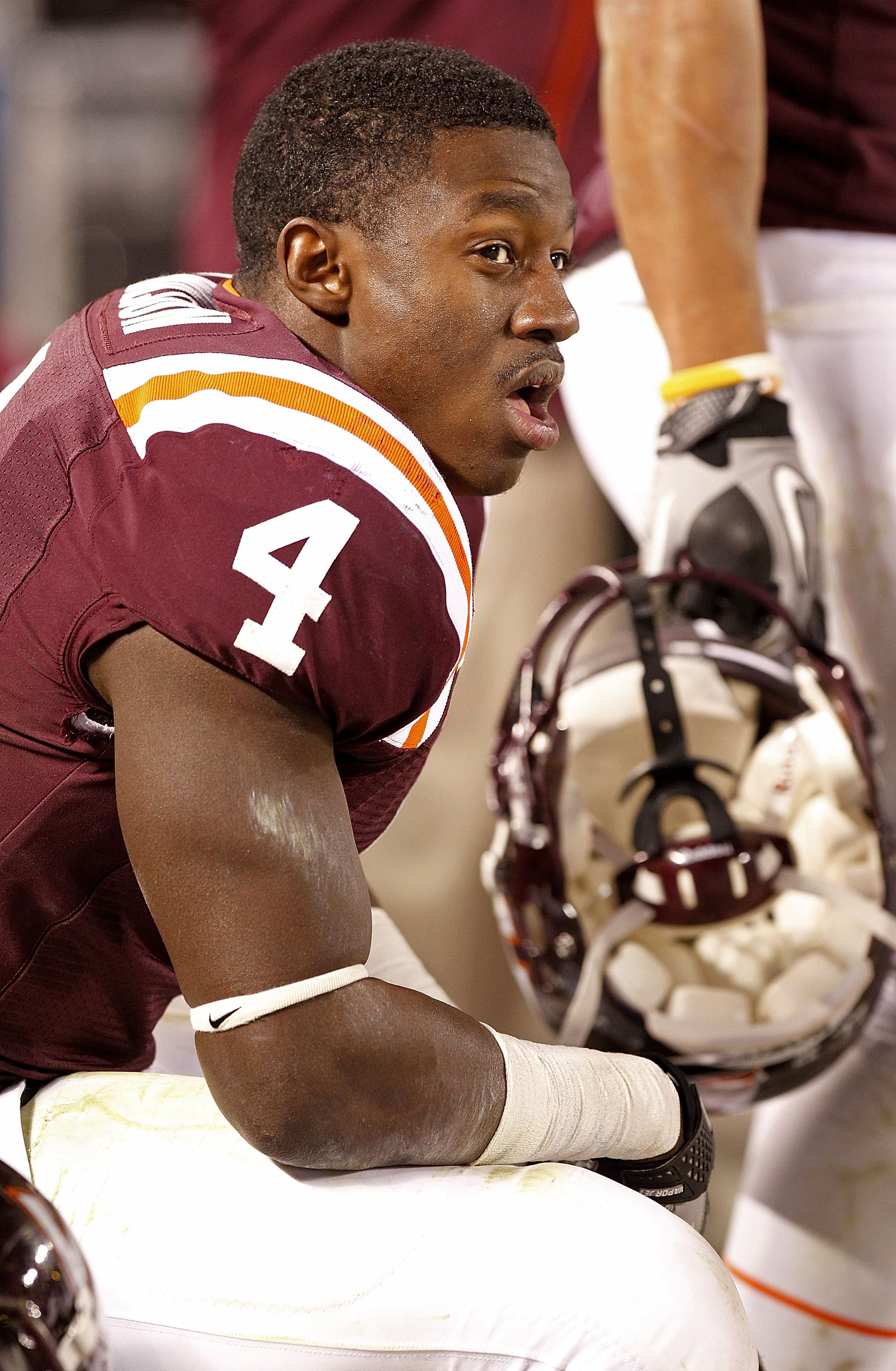 BLACKSBURG, VA - NOVEMBER 04: Running back David Wilson #4 of the Virginia Tech Hokies watches from the sidelines against the Georgia Tech Yellow Jackets at Lane Stadium on November 4, 2010 in Blacksburg, Virginia.  (Photo by Geoff Burke/Getty Images)