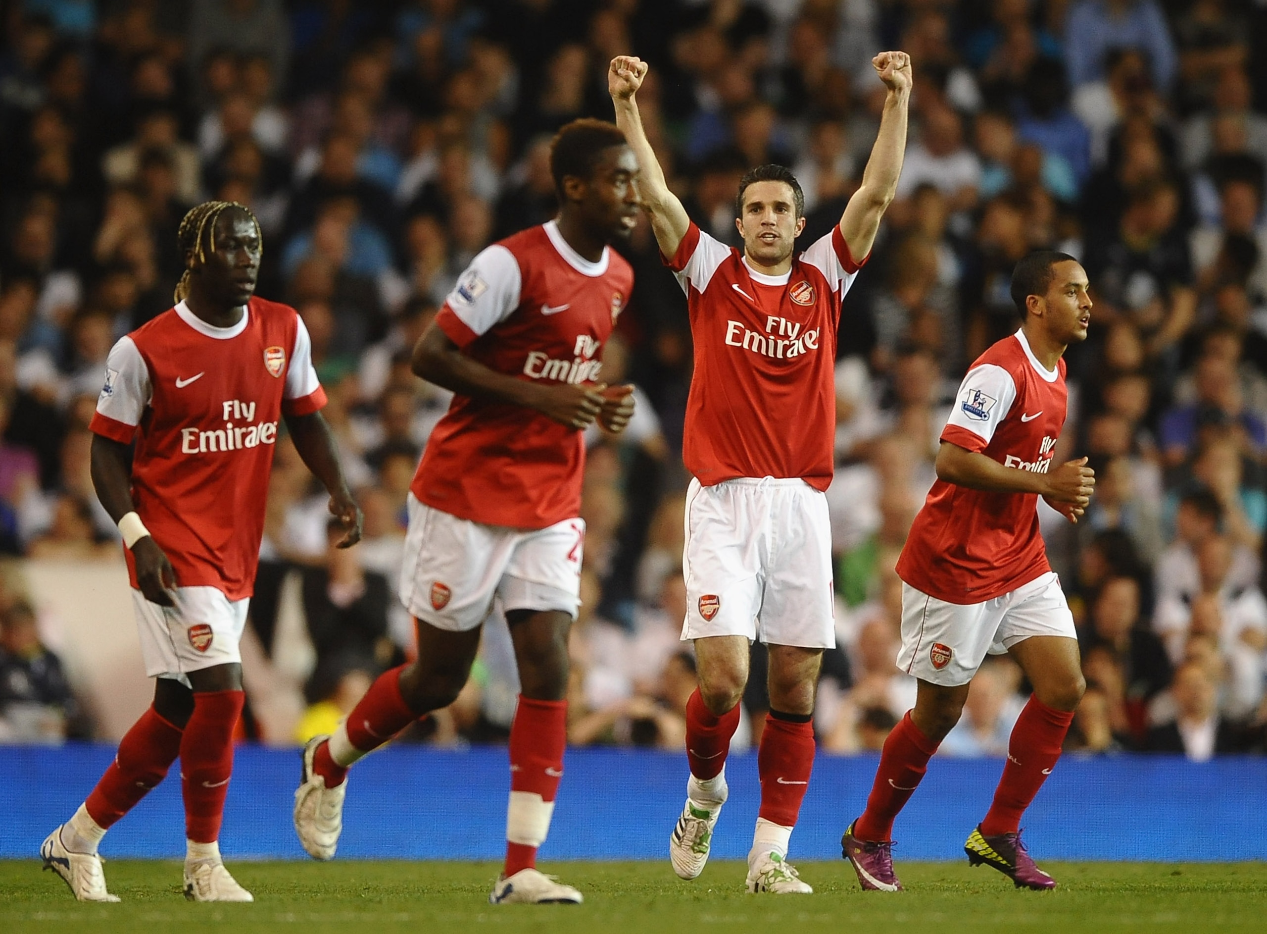 LONDON, ENGLAND - APRIL 20: Robin van Persie of Arsenal celebrates scoring their third goal during the Barclays Premier League match between Tottenham Hotspur and Arsenal at White Hart Lane on April 20, 2011 in London, England. (Photo by Laurence Griffi LONDON, ENGLAND - APRIL 20: Robin van Persie of Arsenal celebrates scoring their third goal during the Barclays Premier League match between Tottenham Hotspur and Arsenal at White Hart Lane on April 20, 2011 in London, England. (Photo by Laurence Griffi