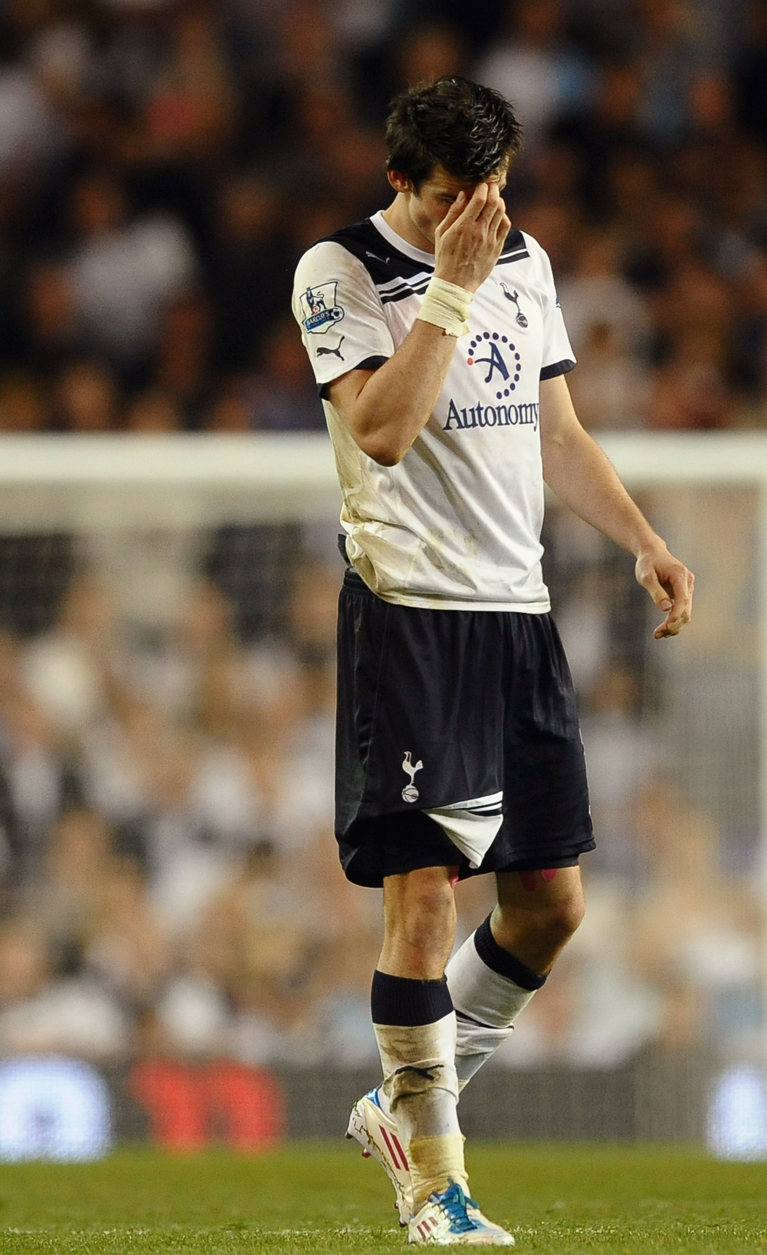 LONDON, ENGLAND - APRIL 20:  Gareth Bale of Spurs looks dejected during the Barclays Premier League match between Tottenham Hotspur and Arsenal at White Hart Lane on April 20, 2011 in London, England.  (Photo by Laurence Griffiths/Getty Images)